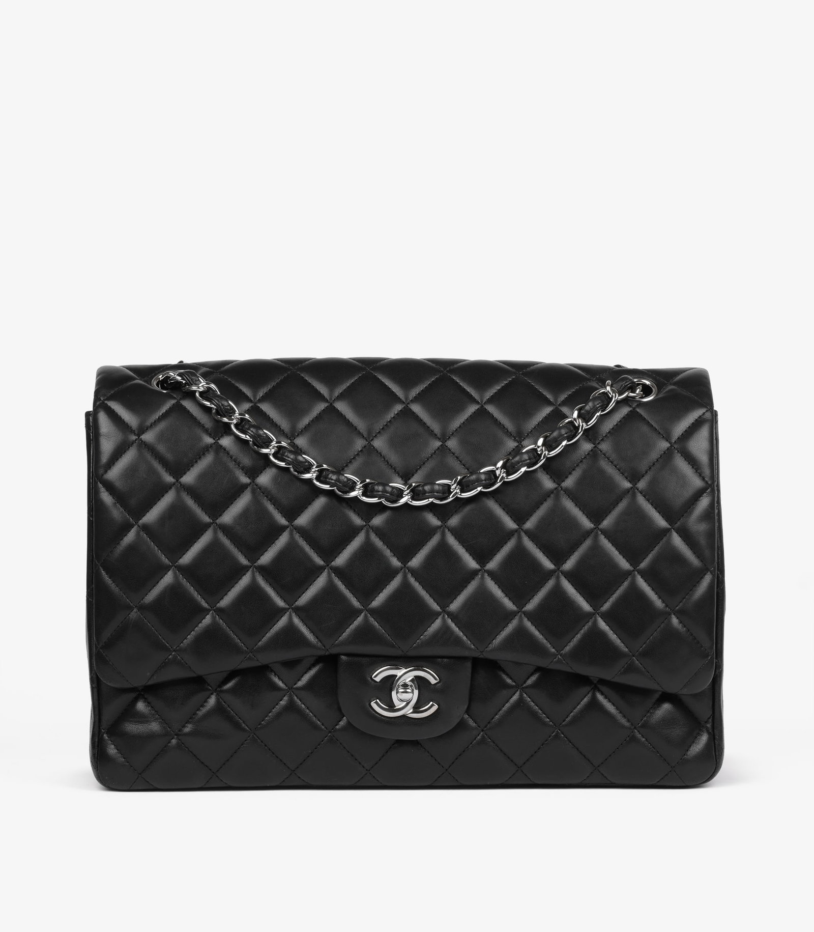 Chanel Black Quilted Lambskin Leather Maxi Classic Single Flap Bag: Title: Chanel Black Quilted Lambskin Leather Maxi Classic Single Flap Bag Description: Chanel Black Quilted Lambskin Leather Maxi Classic Single Flap Bag Product Details CB1457 Brand: Chanel