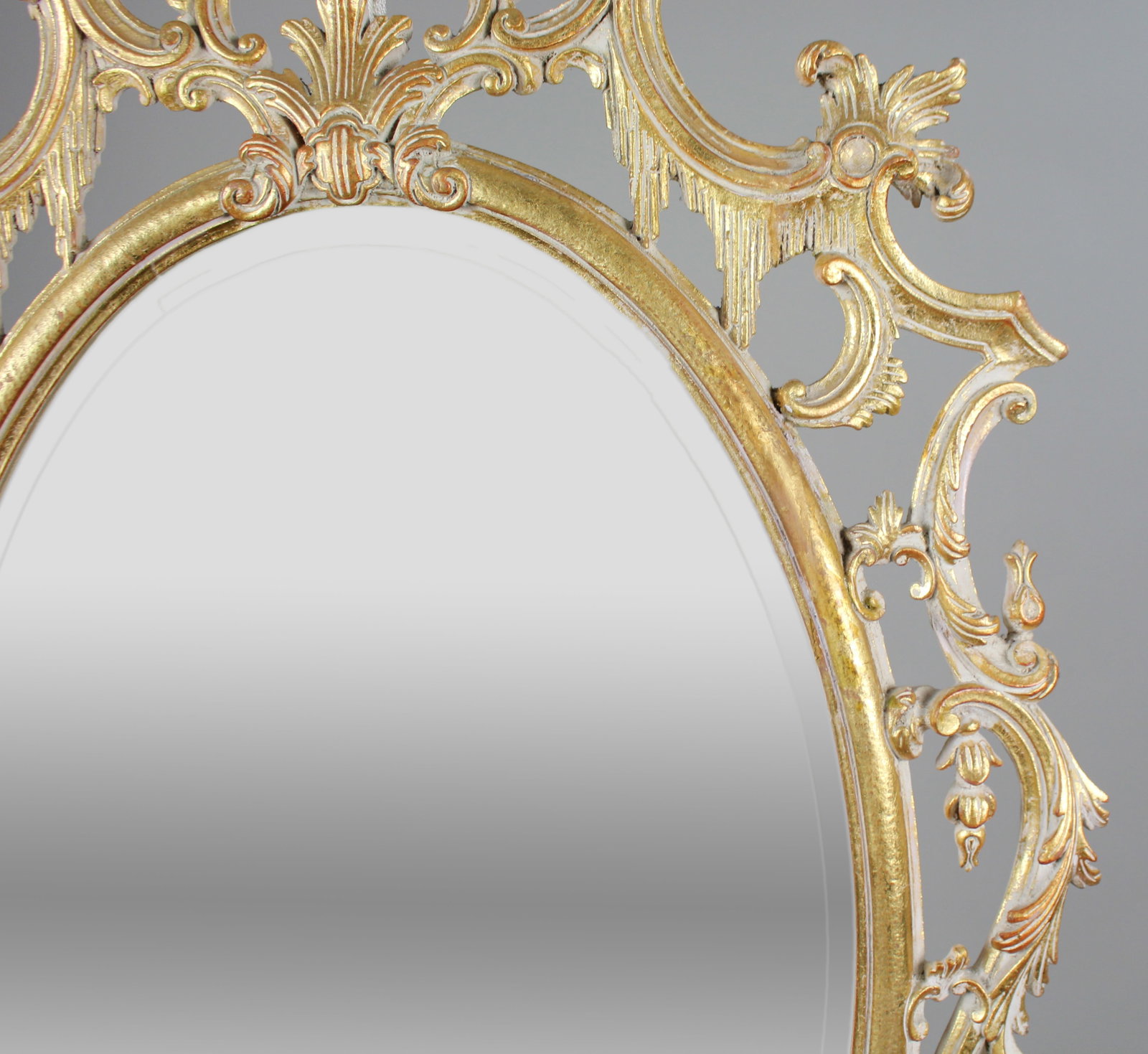 Title: Large Italian Rococo-Style Carved Giltwood Oval Wall Mirror, Florentine, 20th Century - 2