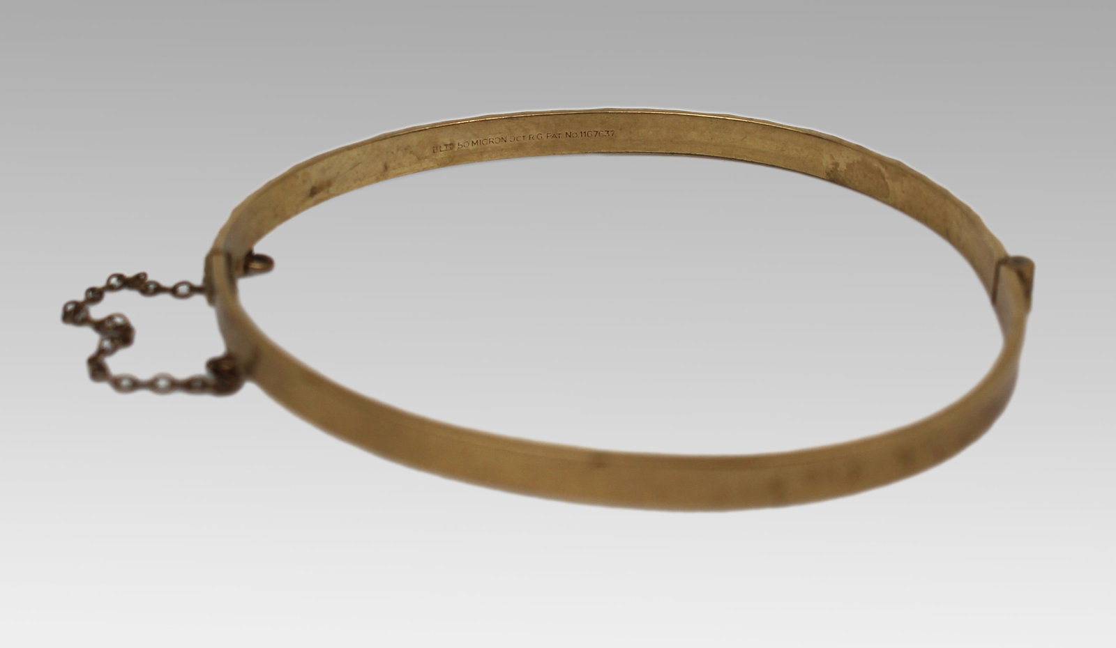 Title: Vintage 9ct Rolled Gold Bangle – c.1960s Description: Vintage 9ct Rolled Gold Bangle &#: Title: Vintage 9ct Rolled Gold Bangle – c.1960s Description: Vintage 9ct Rolled Gold Bangle – c.1960s A vintage 9ct rolled gold bangle dating from the 1960s–70s. The front of the
