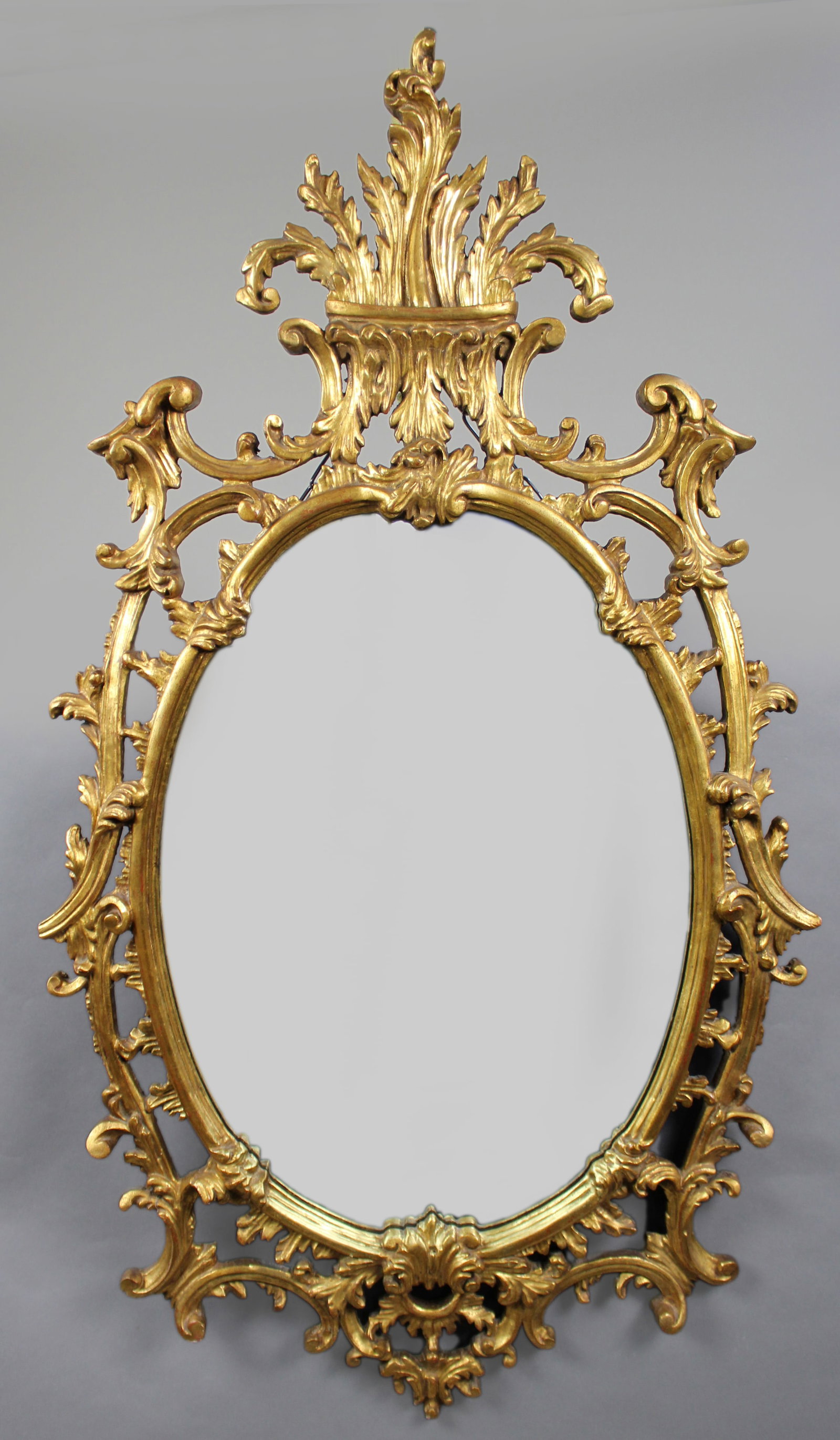 Title: Florentine Giltwood Rococo Revival Wall Mirror, Italy, Mid-20th Century Description:: Title: Florentine Giltwood Rococo Revival Wall Mirror, Italy, Mid-20th Century Description: Impressive Florentine Giltwood Rococo Revival Wall Mirror, Italy, Mid-20th Century Offered is an elegant Flo