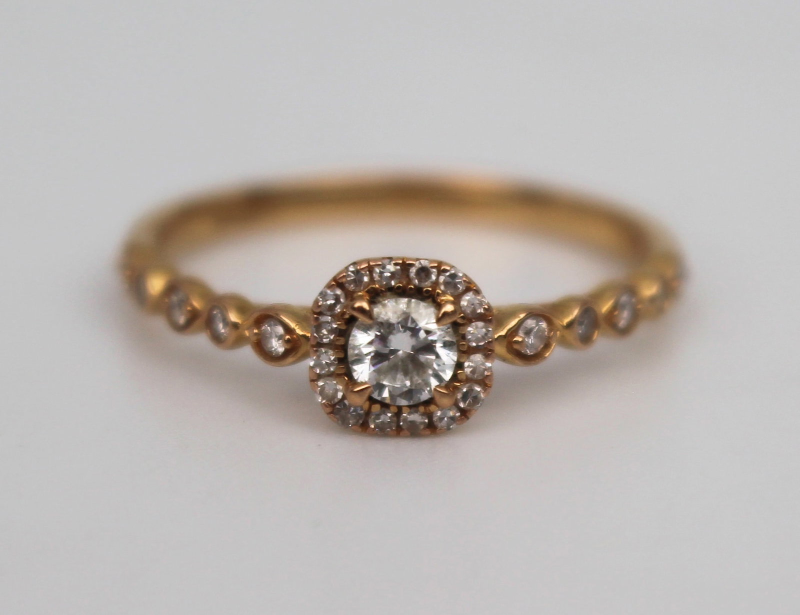 Title: 18ct Rose Gold 0.40 Carat Diamond Ring Description: 18ct Rose Gold 0.40 Carat Diamond Ring: Title: 18ct Rose Gold 0.40 Carat Diamond Ring Description: 18ct Rose Gold 0.40 Carat Diamond Ring Contemporary design. Diamond set 18 ct gold, fully hallmarked. Sponsors S.G. Engraved to the ring