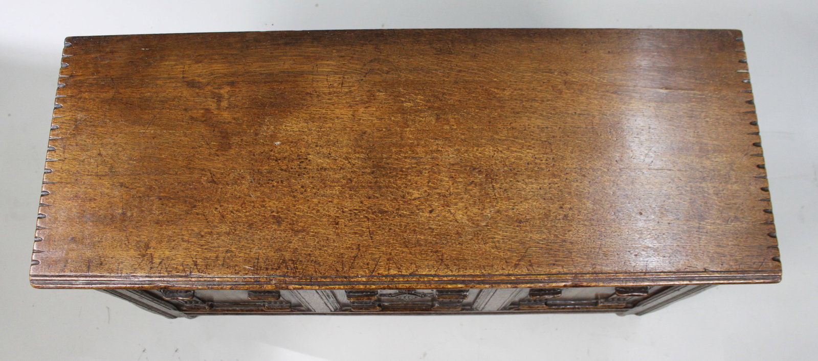 Title: Heavily Carved Oak Coffer in the Jacobean Taste Description: Mid-20th Century English - 10