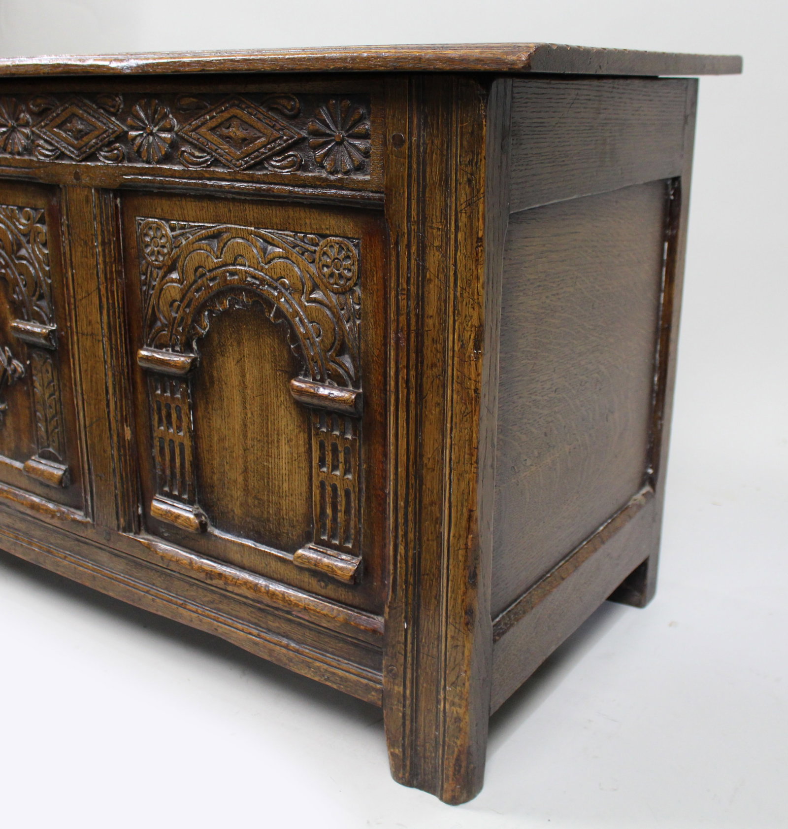 Title: Heavily Carved Oak Coffer in the Jacobean Taste Description: Mid-20th Century English - 11