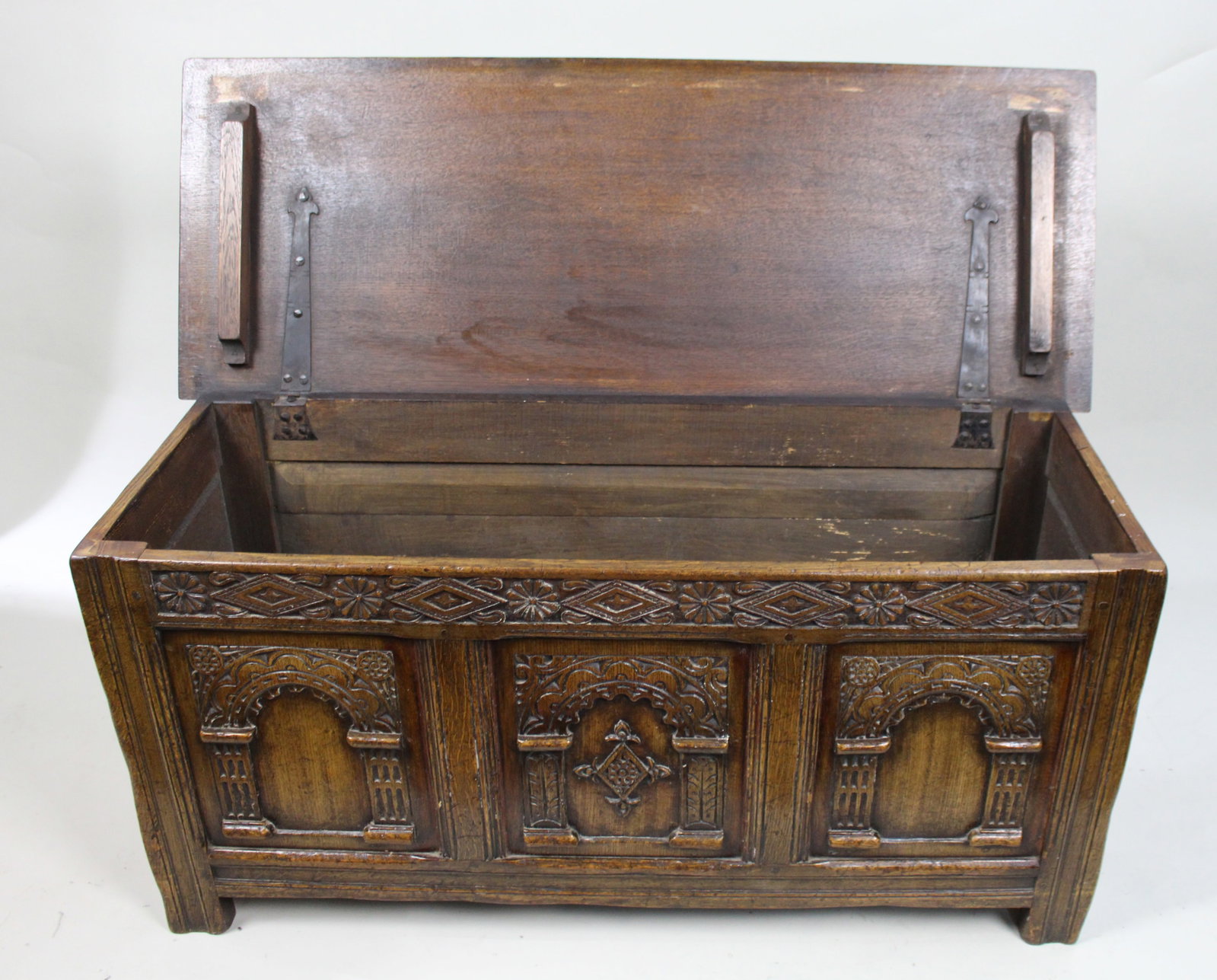 Title: Heavily Carved Oak Coffer in the Jacobean Taste Description: Mid-20th Century English - 14