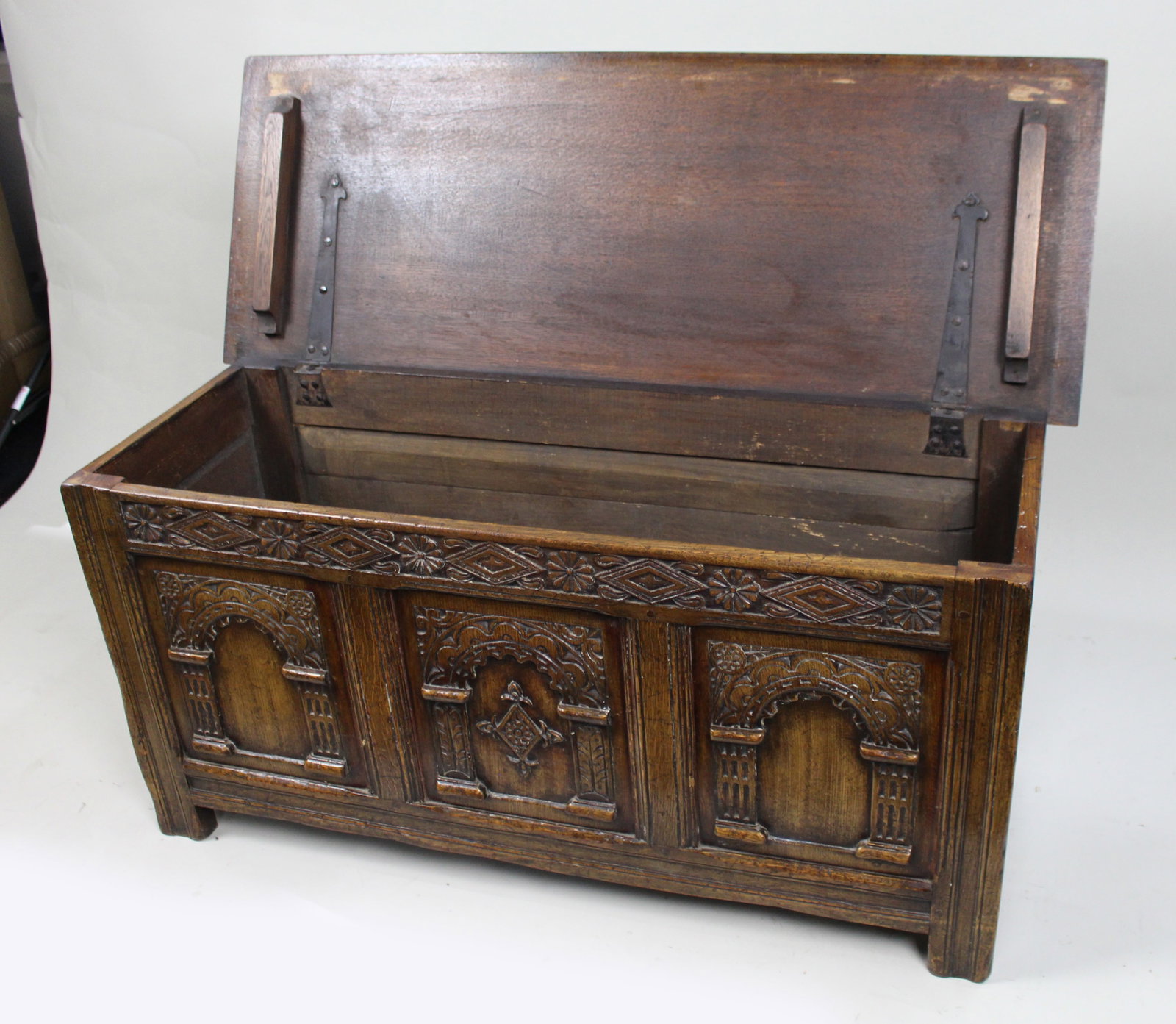 Title: Heavily Carved Oak Coffer in the Jacobean Taste Description: Mid-20th Century English - 15