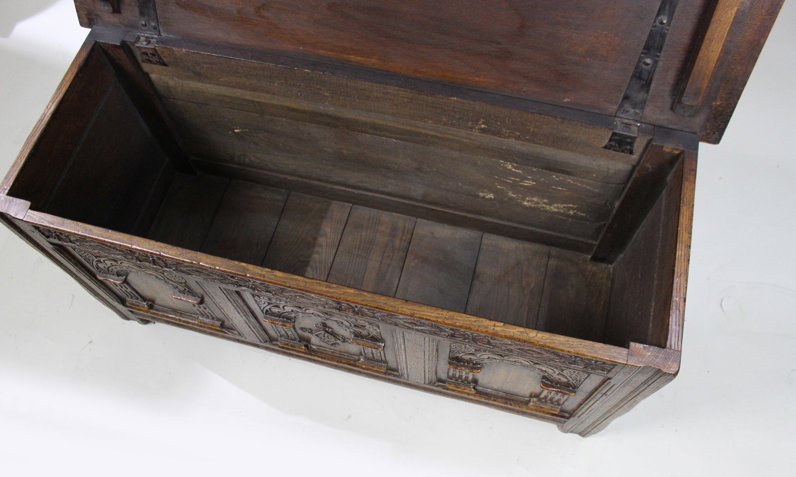 Title: Heavily Carved Oak Coffer in the Jacobean Taste Description: Mid-20th Century English - 17