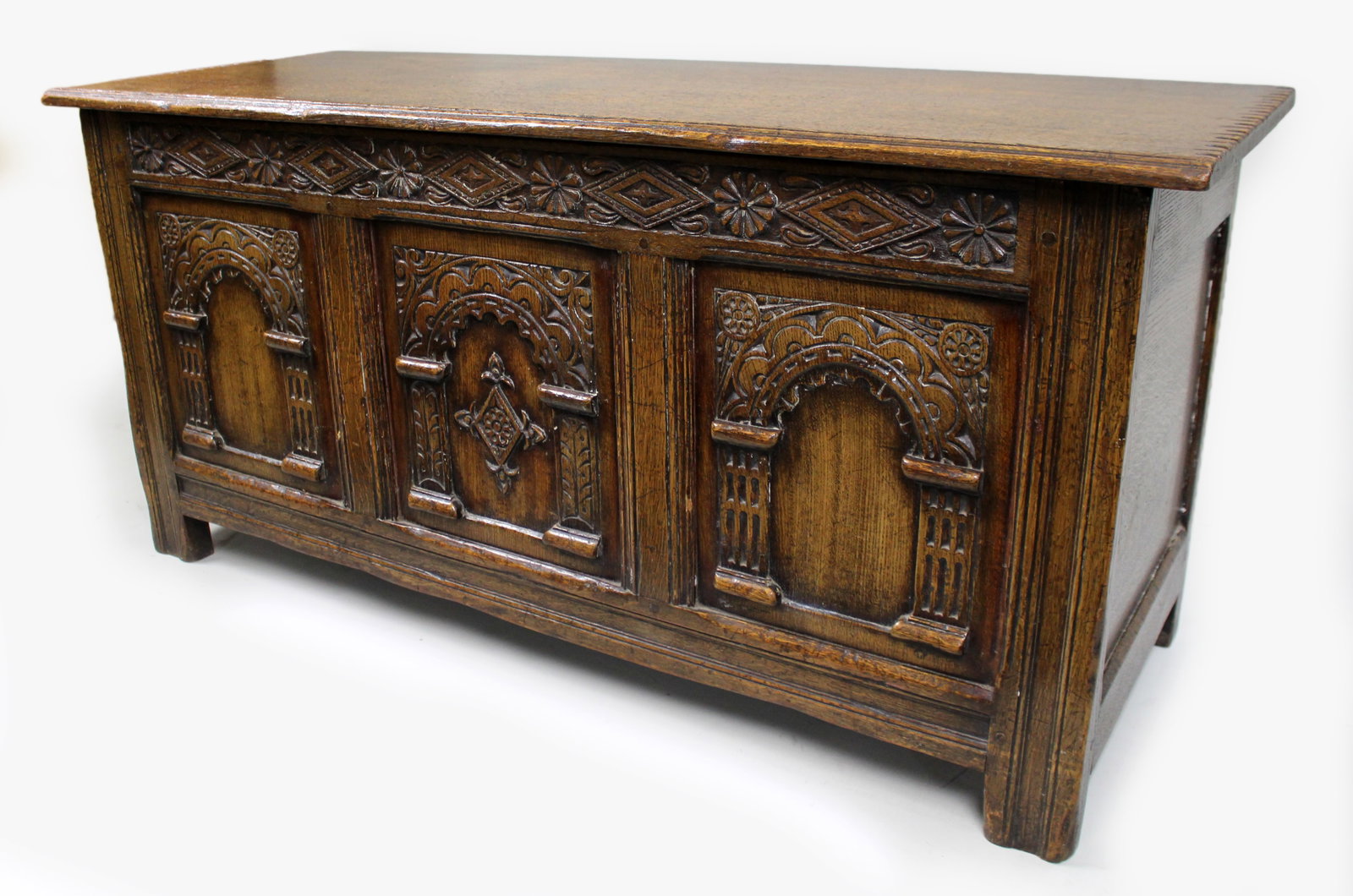 Title: Heavily Carved Oak Coffer in the Jacobean Taste Description: Mid-20th Century English - 6