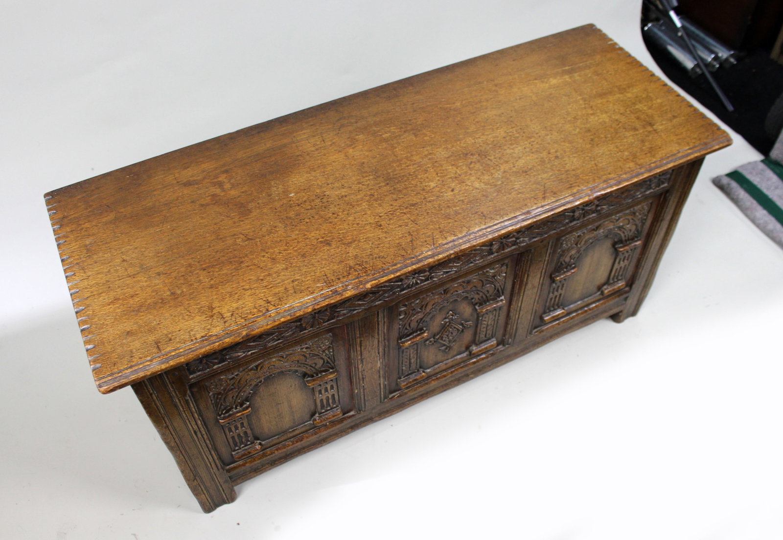Title: Heavily Carved Oak Coffer in the Jacobean Taste Description: Mid-20th Century English - 8