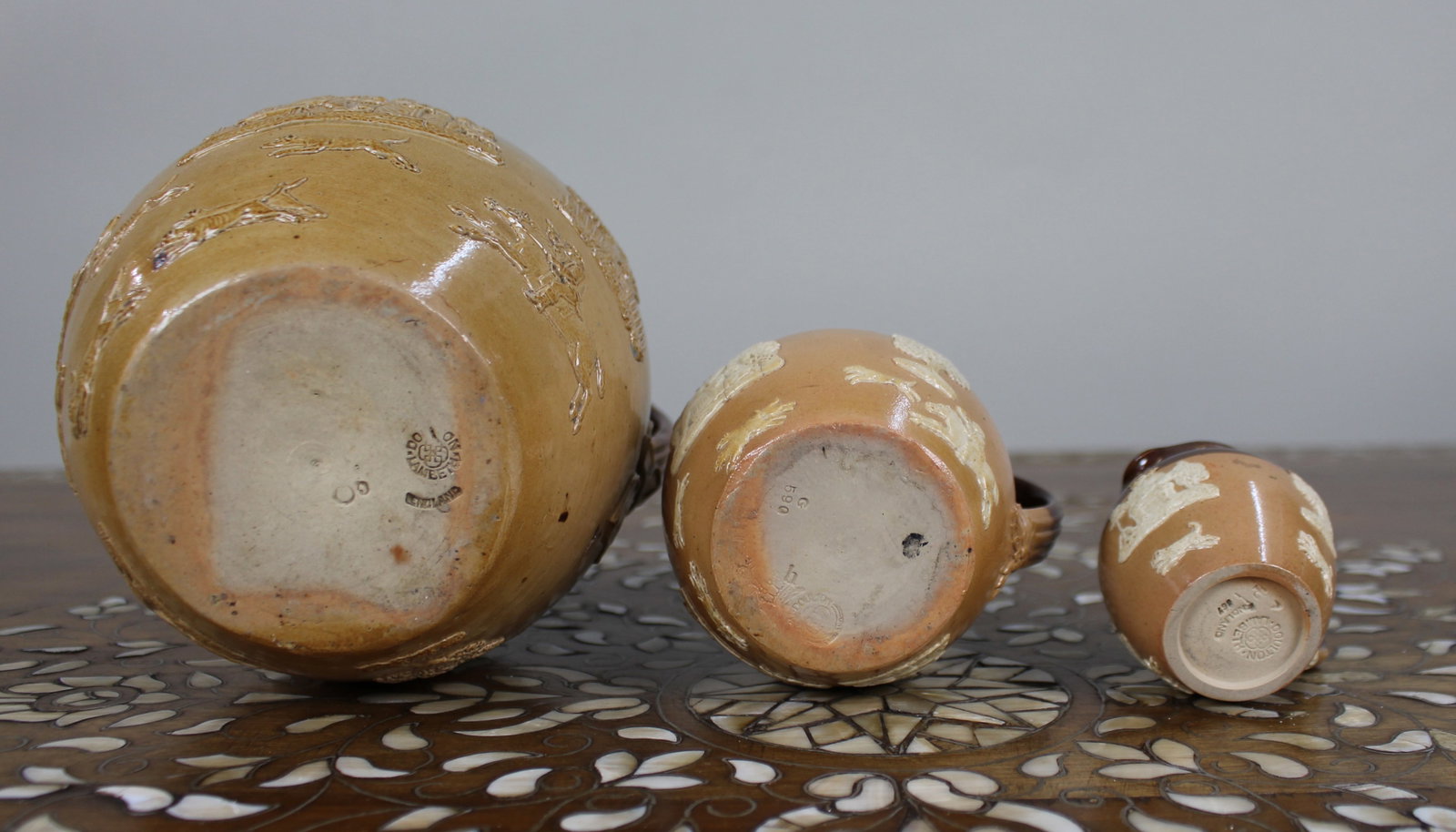 Title: Collection of Three Graduated Doulton Lambeth Stoneware Jugs, c.1900 Description: Set of - 6