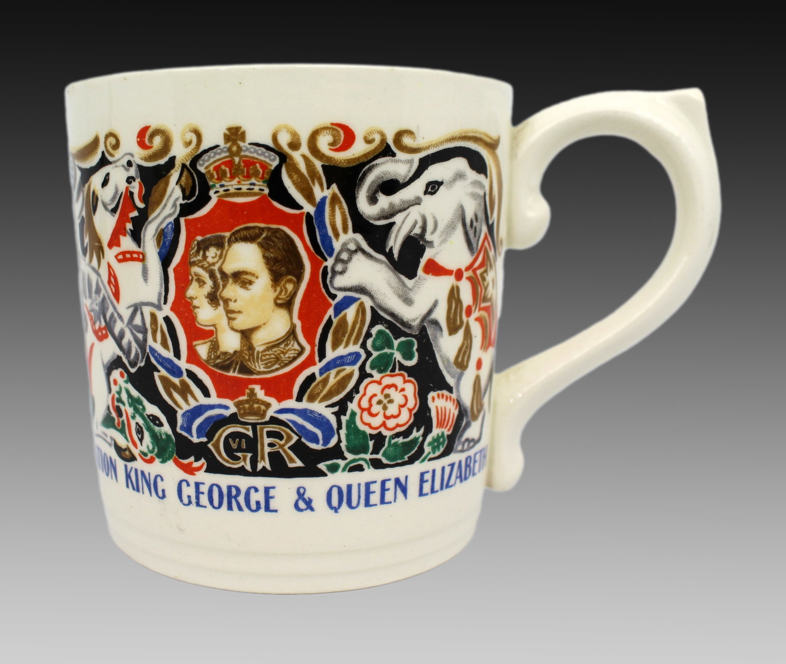 Title: Dame Laura Knight Coronation Tankard Description: Dame Laura Knight 1937 King George VI: Title: Dame Laura Knight Coronation Tankard Description: Dame Laura Knight 1937 King George VI Coronation Tankard Measures 8 x 12 x 8.5 (height) cm Very good condition; no chips, cracks or repairs