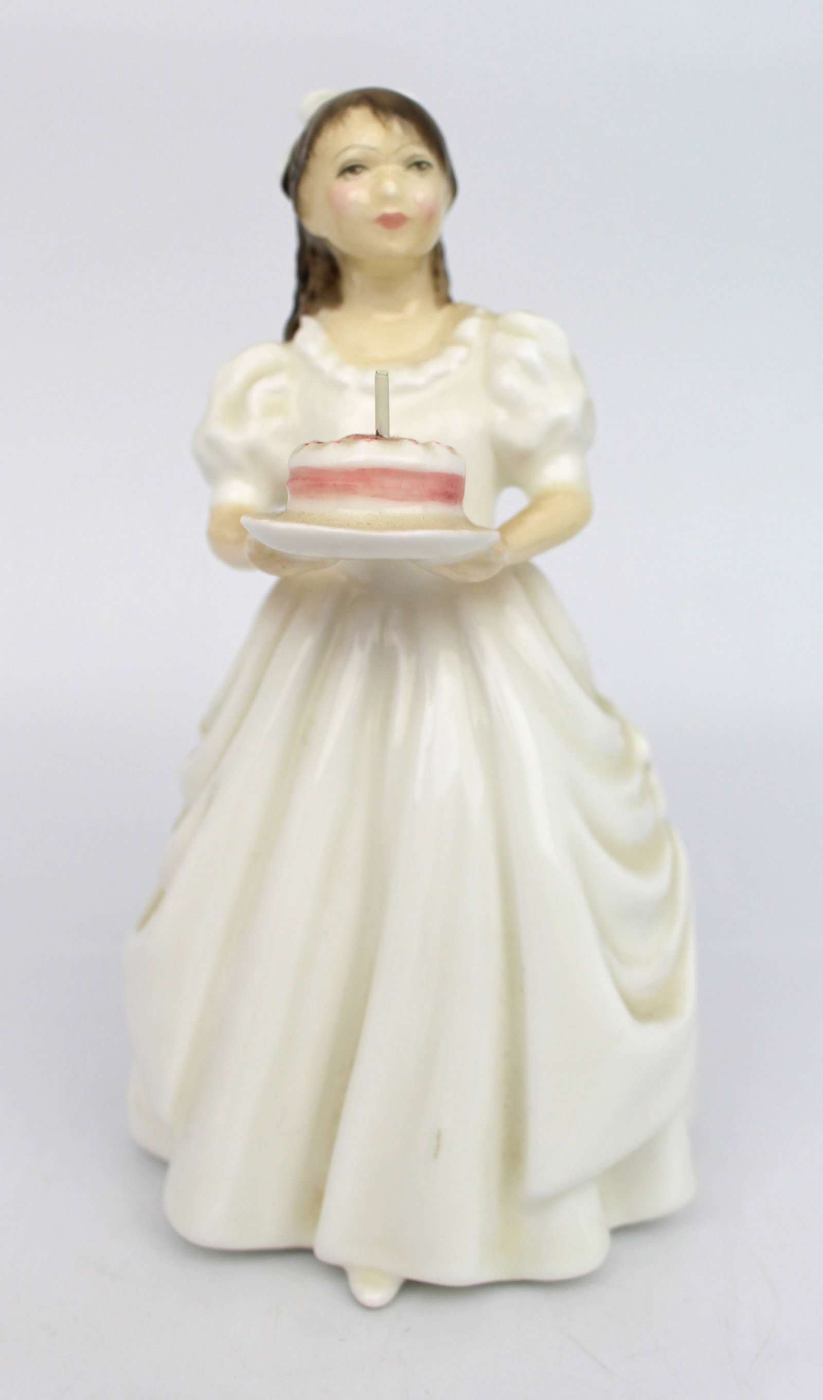 Title: Royal Doulton Figurine Birthday Girl HN 3423 Description: Royal Doulton Figurine Birthday: Title: Royal Doulton Figurine Birthday Girl HN 3423 Description: Royal Doulton Figurine Birthday Girl HN 3423 Fully factory backstamp Height: 16 cm Very good condition; no chips, cracks or repairs