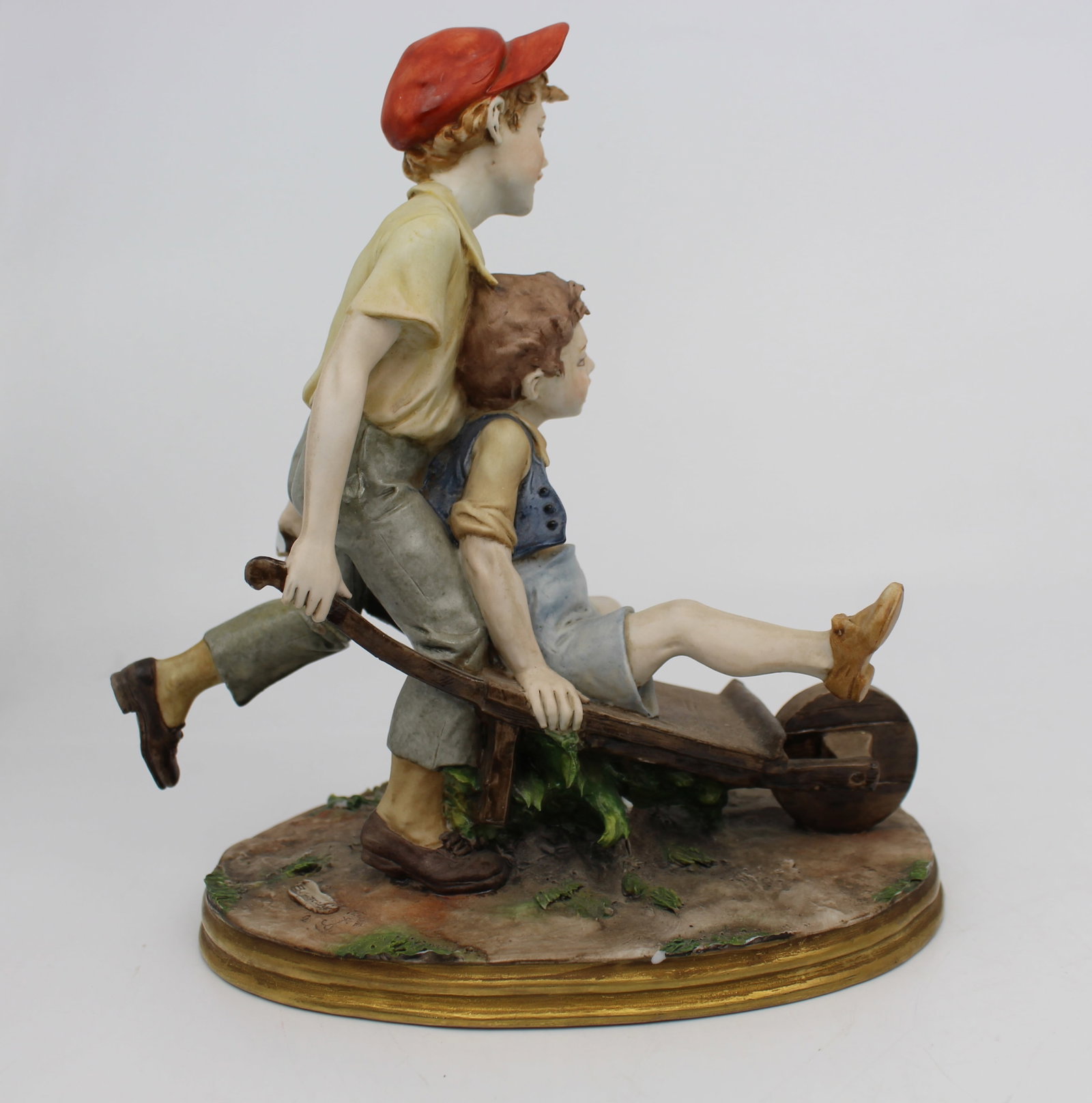 Title: Capodimonte Figurine Boys in Wheelbarrown by Bernacchio Description: Capodimonte Figurine - 3