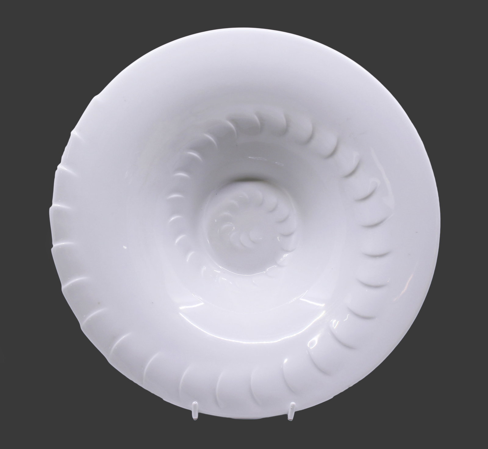 Title: Royal Worcester Bowl Last Factory Piece Description: Item: White porcelain bowl on a raised: Title: Royal Worcester Bowl Last Factory Piece Description: Item: White porcelain bowl on a raised foot Design: Spiral shell-like moulded pattern, elegantly minimal in pure white Backstamp: Features