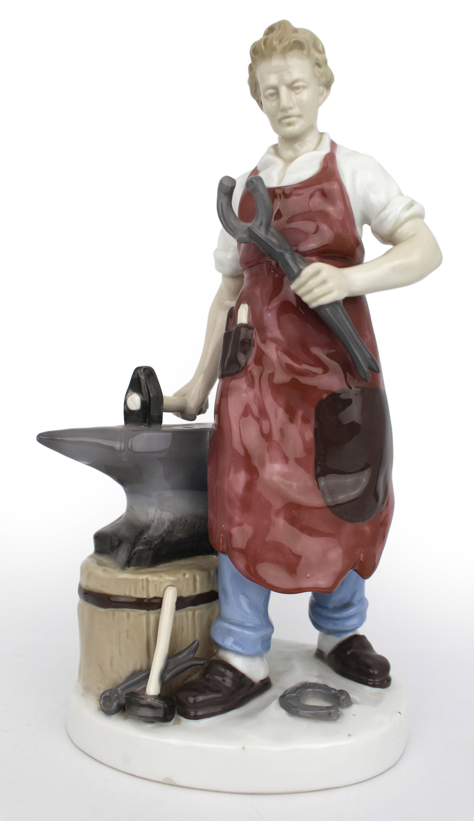 Title: Vintage German Grafenthal Carl Scheidig Porcelain Blacksmith Figurine Description: Vintage: Title: Vintage German Grafenthal Carl Scheidig Porcelain Blacksmith Figurine Description: Vintage German Grafenthal Carl Scheidig Porcelain Blacksmith Figurine German, mid 20th c. Measures 13 x 9 x