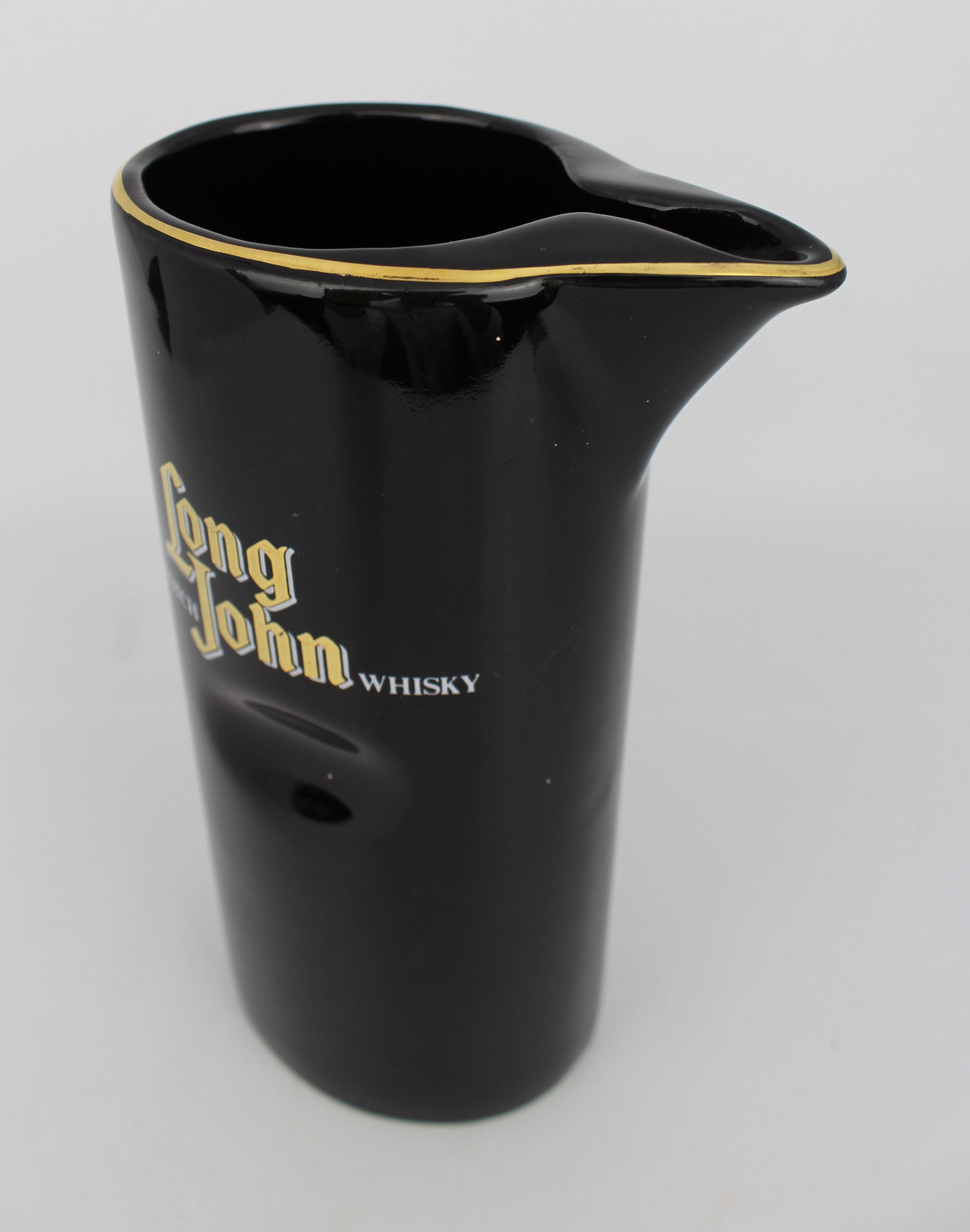 Title: Long John Whisky Jug Description: Long John Whisky Jug Condition: Used Delivery option: - 3