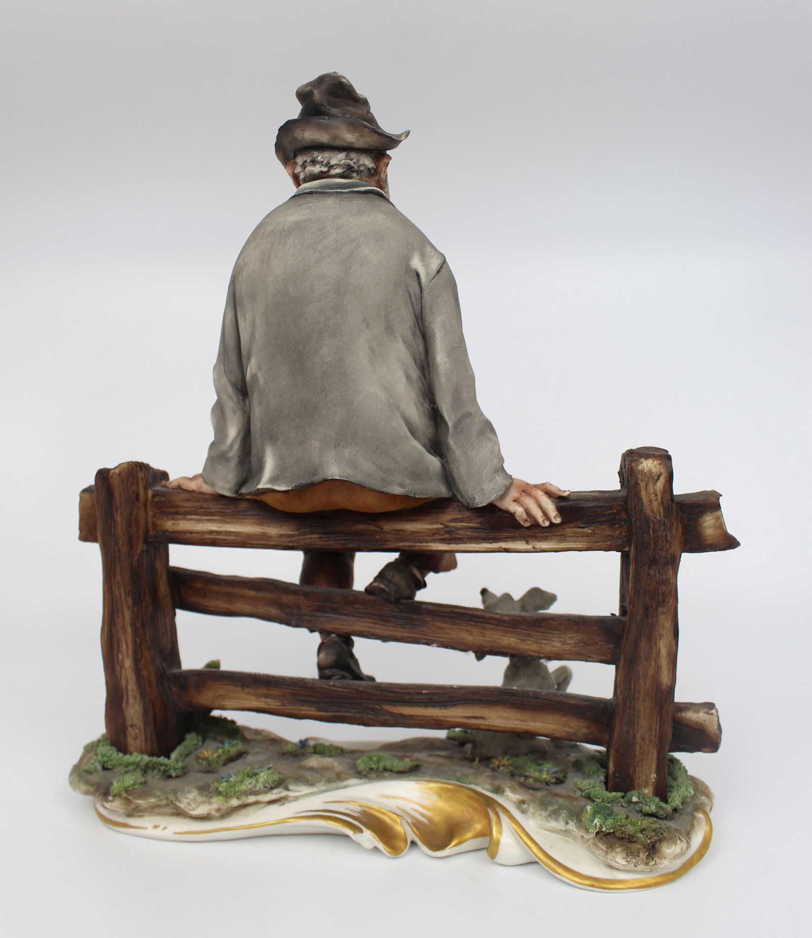 Title: Capodimonte Tramp on Fence Description: Capodimonte Tramp on Fence Made in Italy, c.1970. - 4