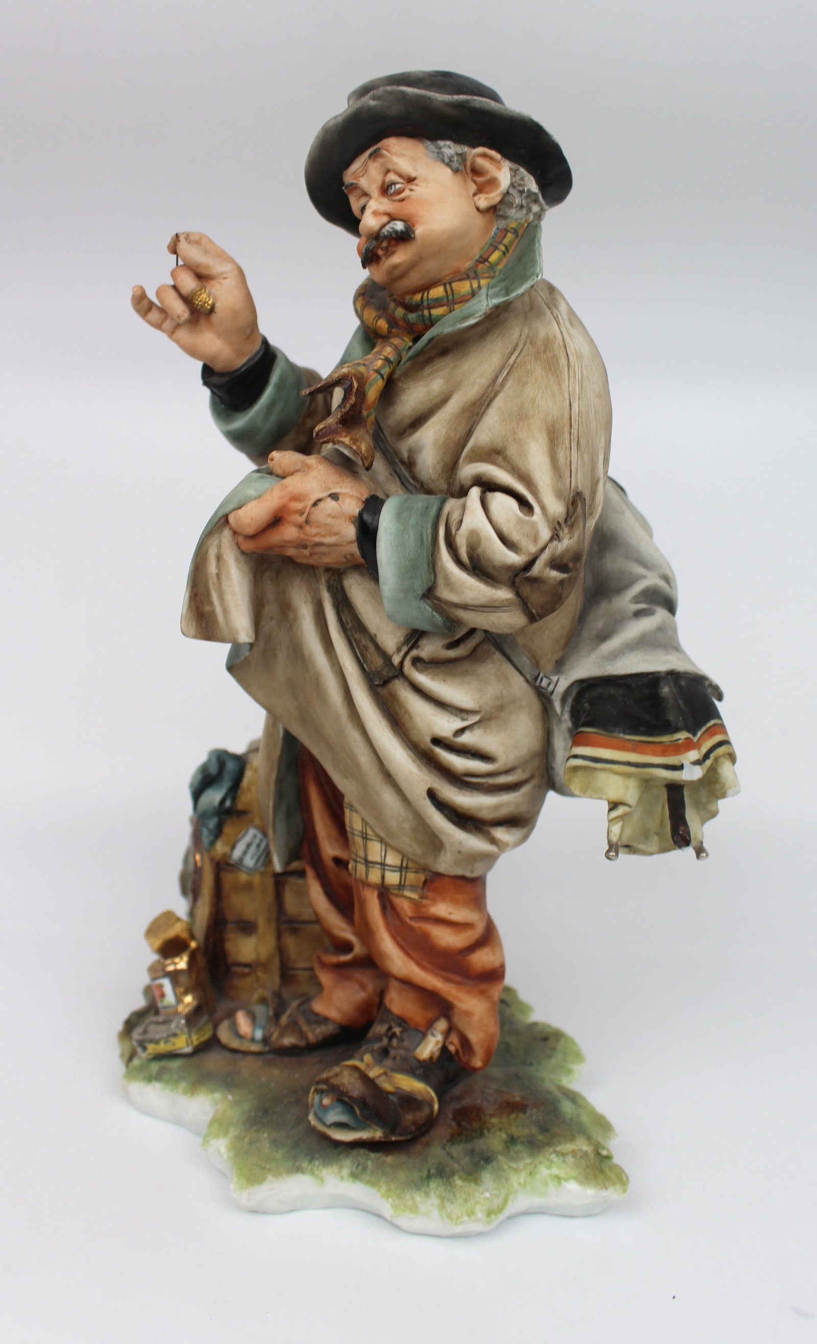 Title: Capodimonte Tramp Patching His Coat by Tyche Bruno Description: Capodimonte Tramp Patching - 3