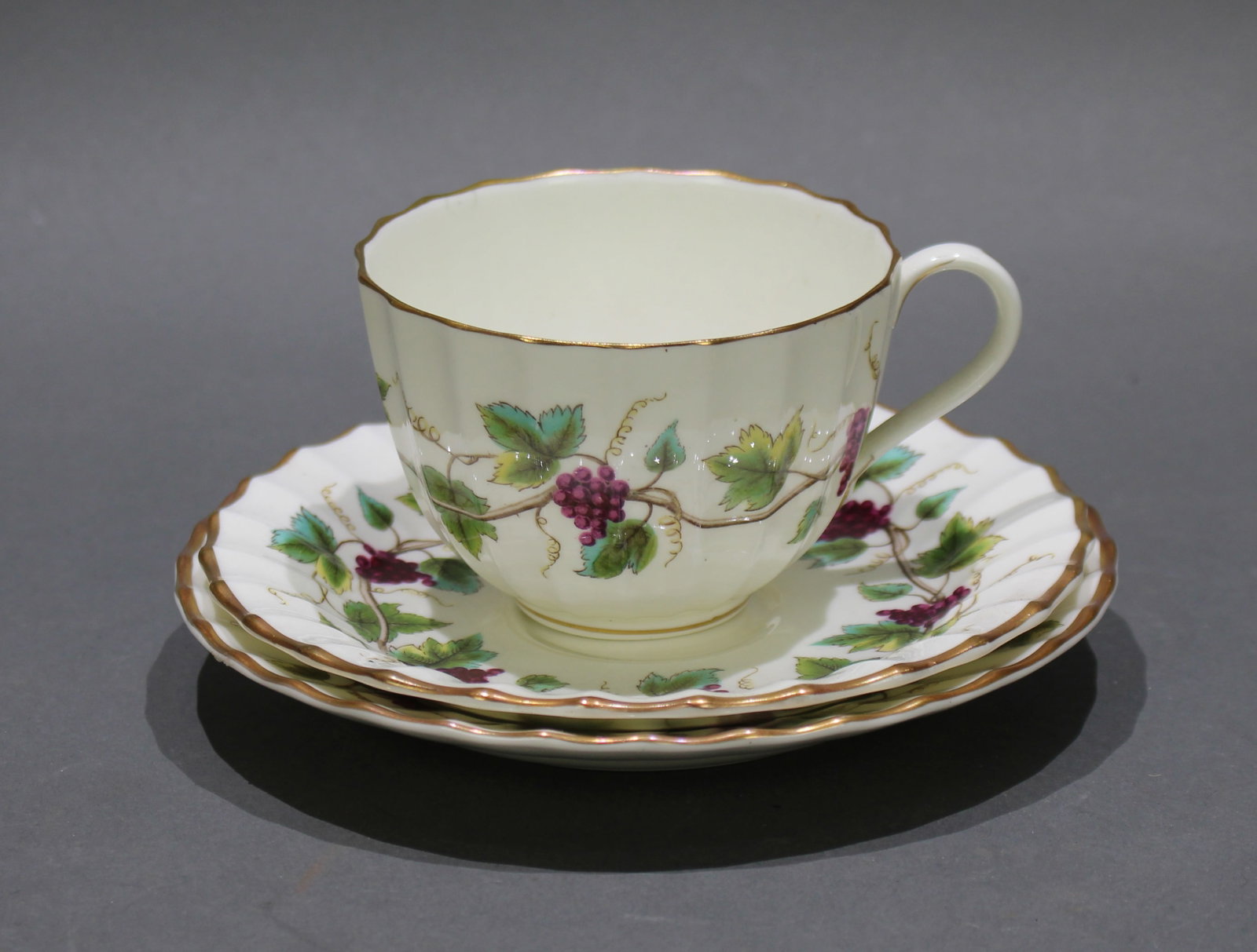 Title: Royal Worcester Bacchanal Pattern Trio Description: Royal Worcester Bacchanal tea cup, saucer: Title: Royal Worcester Bacchanal Pattern Trio Description: Royal Worcester Bacchanal tea cup, saucer & tea plate trio. Discontinued original vintage English pattern. Each piece fully stamped to