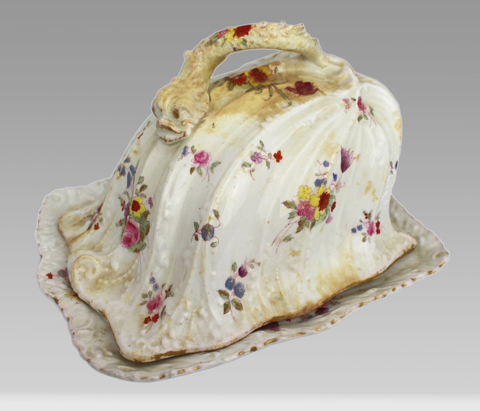 Title: Antique Staffordshire Cheese Dish Description: Antique Staffordshire Cheese Dish Measures: Title: Antique Staffordshire Cheese Dish Description: Antique Staffordshire Cheese Dish Measures 27 x 22 x 16 (height) cm. Hairline crack to the lid as pictured Condition: Used Delivery option:
