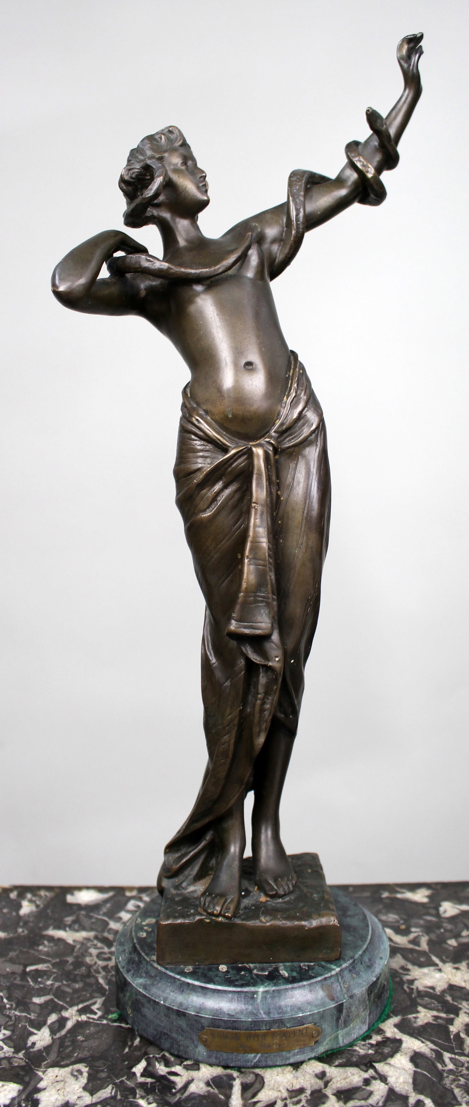 Title: Fine Art Deco Patinated Bronze Figure of a Woman with Serpent Description: Fine Art Deco: Title: Fine Art Deco Patinated Bronze Figure of a Woman with Serpent Description: Fine Art Deco Patinated Bronze Figure of a Woman with Serpent A striking decorative patinated bronze figure depicting 