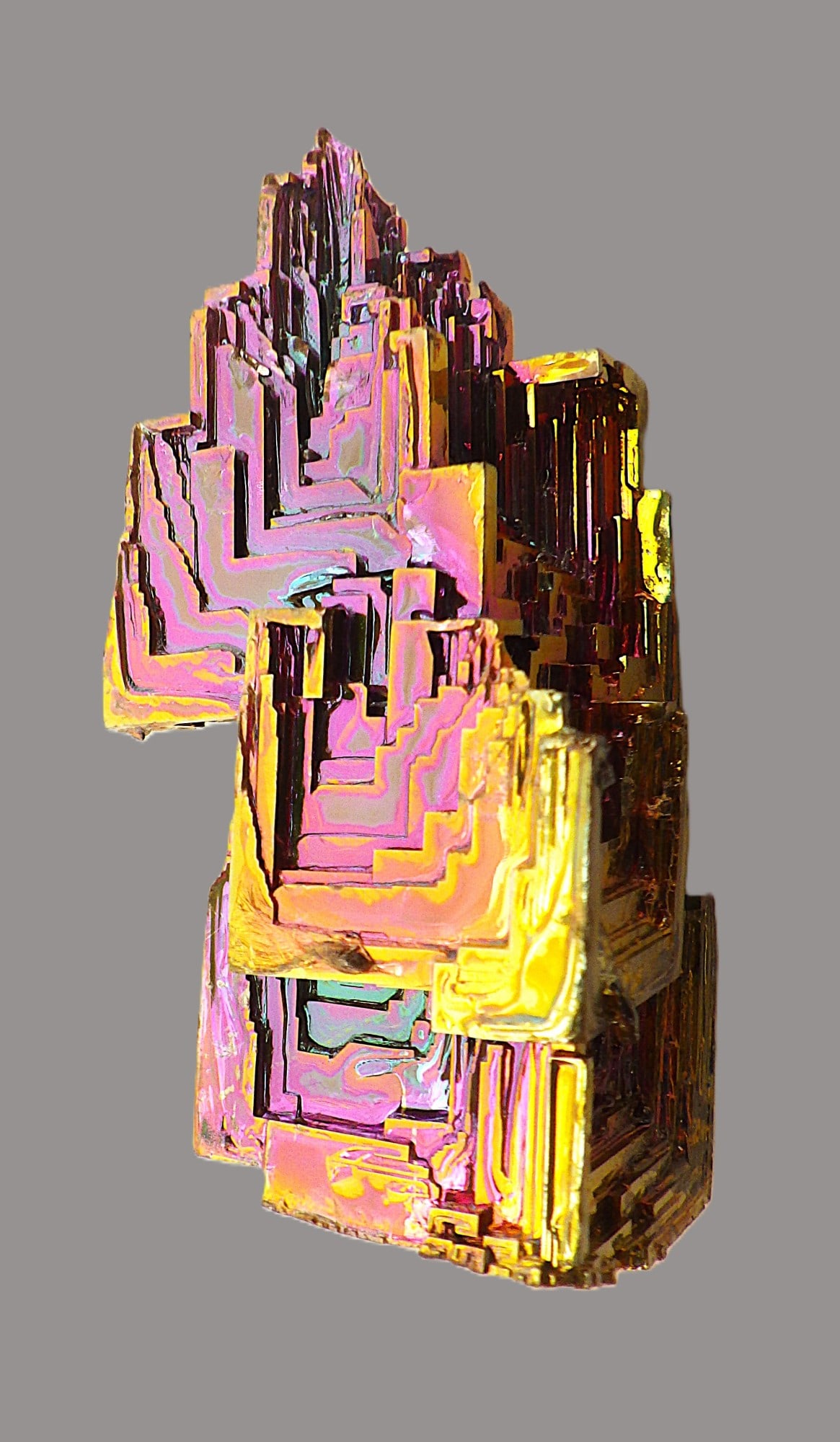 Bismuth Metal, Stair-stepped, Iridescent Crystal 8cm, 93G: Title: Bismuth Metal, Stair-stepped, Iridescent Crystal 8cm, 93G Description: A mesmerising Bismuth metal, stair-stepped crystal (called "hopper" crystal) with vibrant, iridescent rainbow colours,