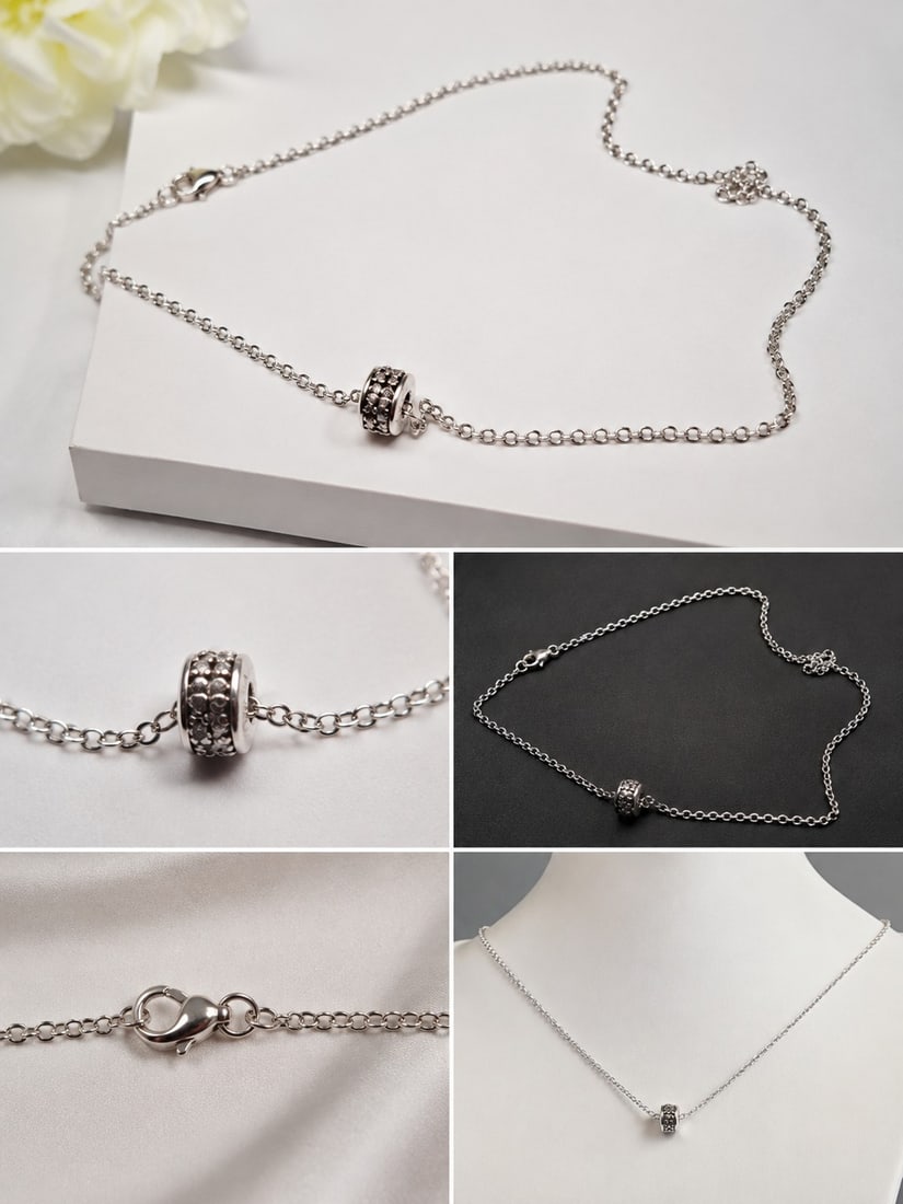 Silver-Tone Chain Necklace with Decorative Barrel Bead: Title: Silver-Tone Chain Necklace with Decorative Barrel Bead Description: Elegant silver-tone chain necklace featuring a decorative barrel-shaped centre bead with textured detailing. A simple and
