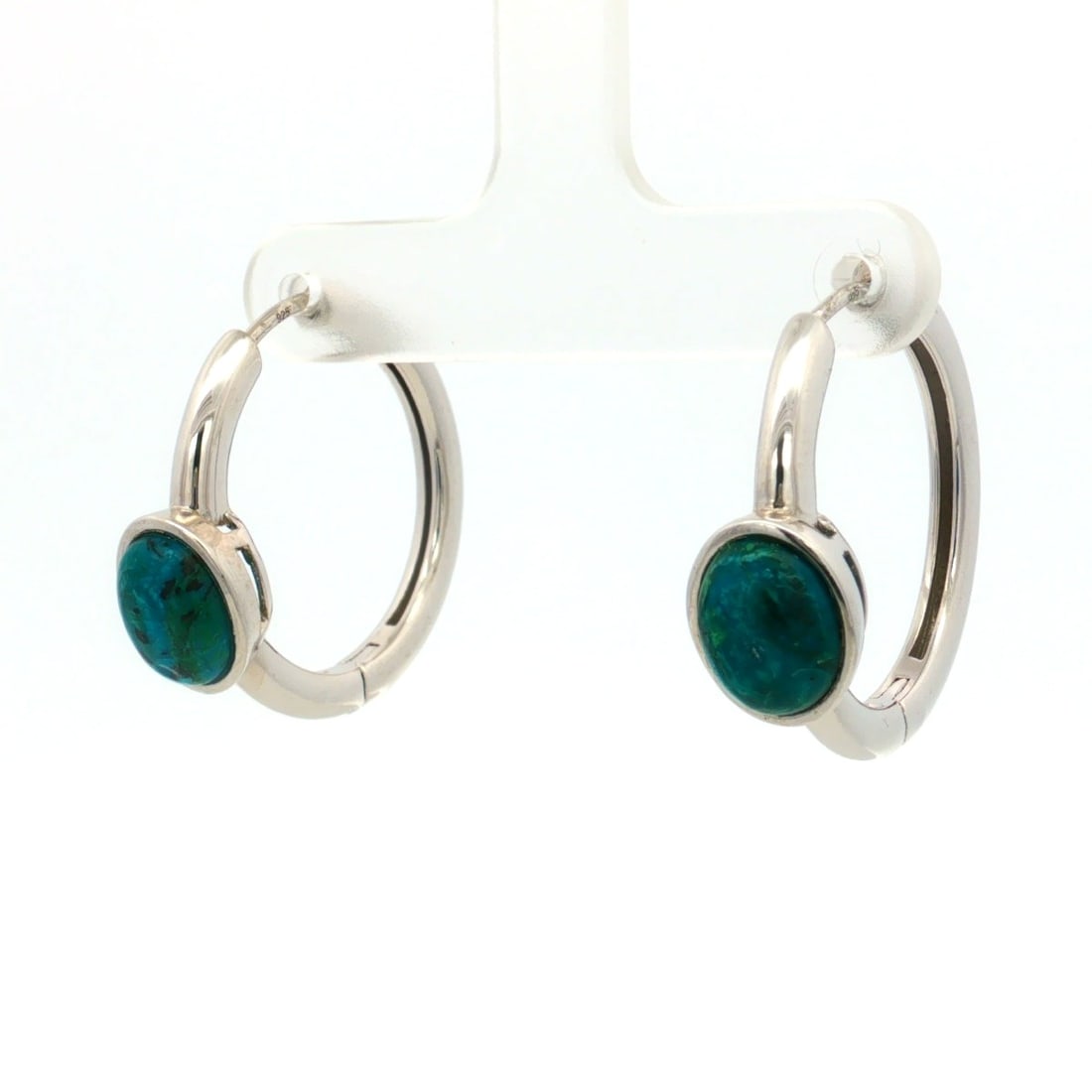 HRD Certified Chrysocolla Cabochon Oval Clip-On Earrings – 925 Sterling Silver: Title: HRD Certified Chrysocolla Cabochon Oval Clip-On Earrings – 925 Sterling Silver Description: A fine pair of 925 Sterling Silver clip-on earrings featuring oval Chrysocolla cabochon