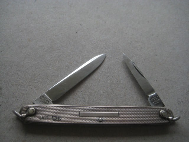 Title: George V RMS Queen Mary Silver Hafted Twin Steel Bladed Folding Penknife Description: - 2