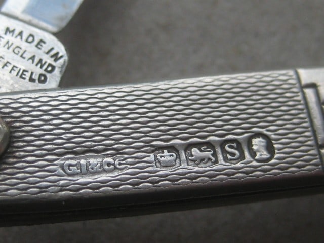 Title: George V RMS Queen Mary Silver Hafted Twin Steel Bladed Folding Penknife Description: - 3