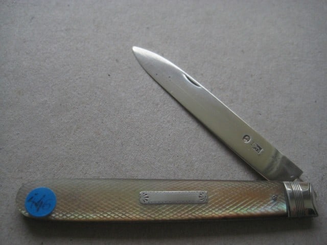 George III Mother of Pearl Hafted Silver Bladed Folding Fruit Knife: Title: George III Mother of Pearl Hafted Silver Bladed Folding Fruit Knife Description: George III Mother of Pearl Hafted Silver Bladed Folding Fruit Knife. The handle is decorated with a
