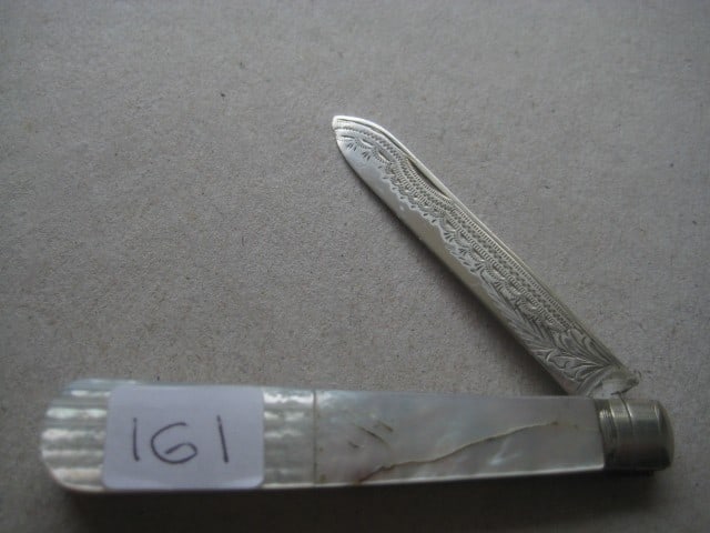 George V Mother of Pearl Hafted Silver Bladed Folding Fruit Knife: Title: George V Mother of Pearl Hafted Silver Bladed Folding Fruit Knife Description: George V Mother of Pearl Hafted Silver Bladed Folding Fruit Knife. The handle is engraved