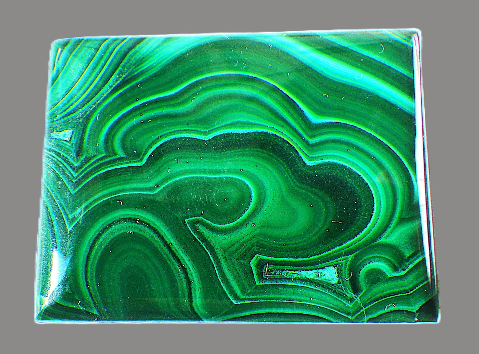 Rectangular Malachite Cabochon 131 Carats: Title: Rectangular Malachite Cabochon 131 Carats Description: A beautiful, totally natural, Malachite rectangular cabochon. Dimensions: 39.1 x 30.3 x 7.0 mm, weight: 131 carats, origin: