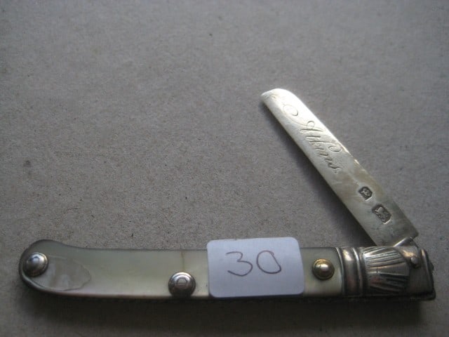 Rare George III Scimitar Silver Bladed Folding Fruit Knife: Title: Rare George III Scimitar Silver Bladed Folding Fruit Knife Description: Rare George III Mother of Pearl Hafted Scimitar Silver Bladed Folding Fruit Knife. The hand