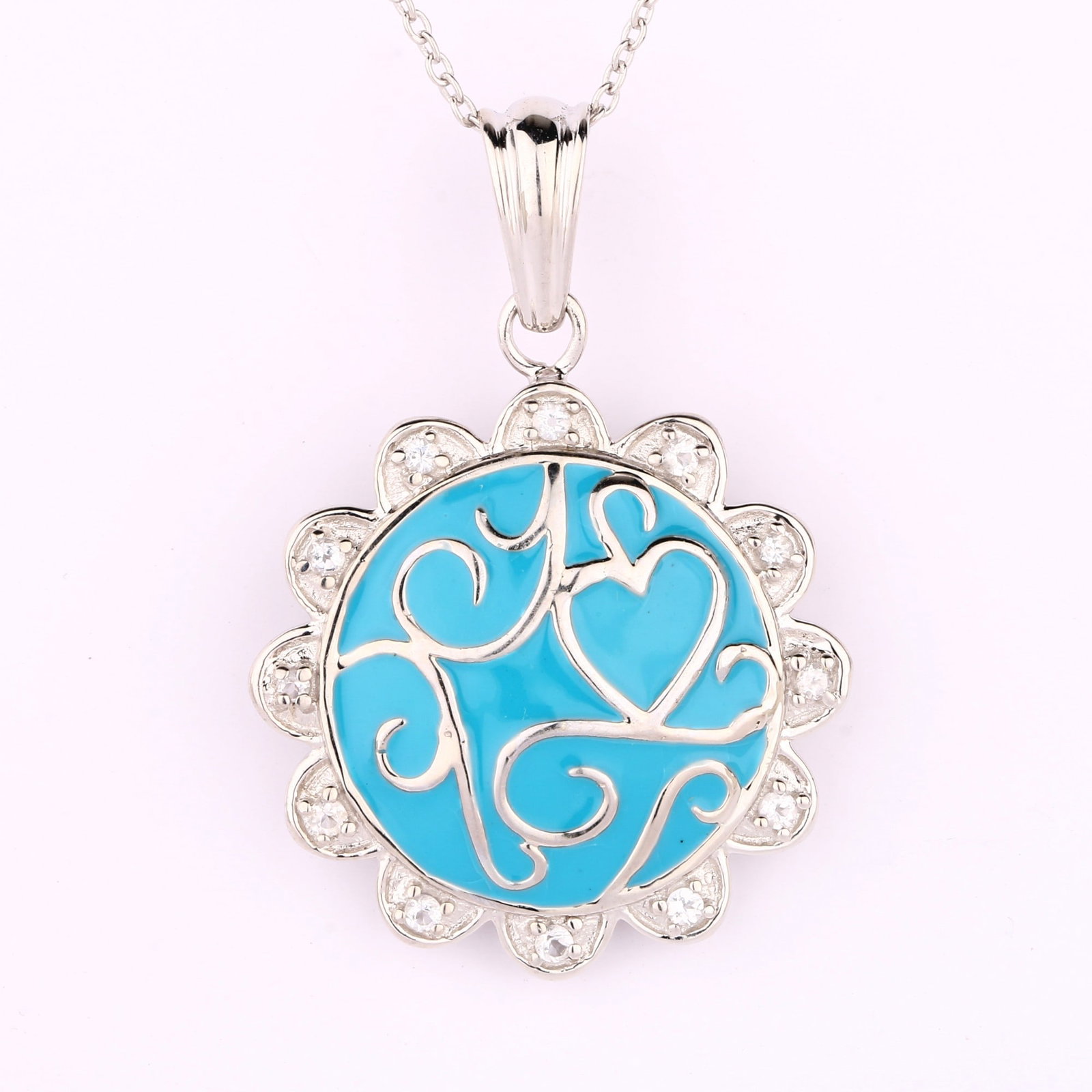 HRD Certified White Topaz Enamel Pendant – 925 Sterling Silver: Title: HRD Certified White Topaz Enamel Pendant – 925 Sterling Silver Description: A fine 925 Sterling Silver pendant featuring White Topaz round gemstones with enamel detailing, finished wit