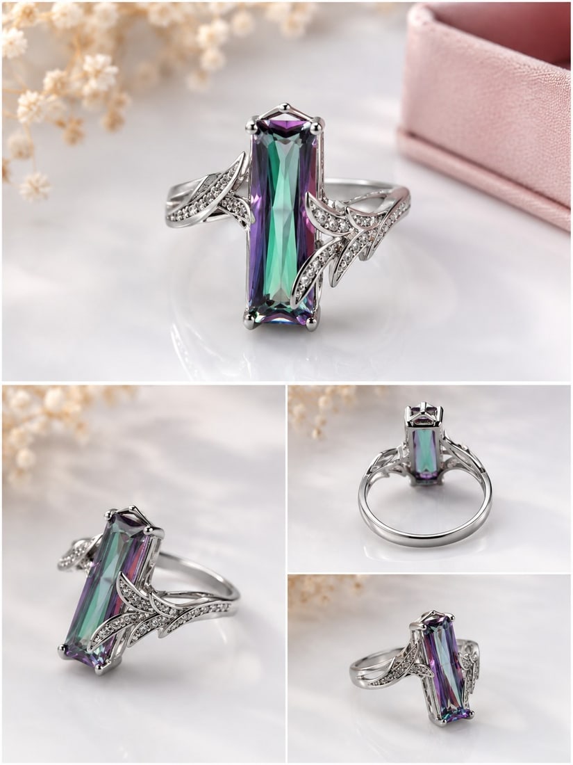 Multicolour Faceted Stone Ring – Size 18: Title: Multicolour Faceted Stone Ring – Size 18 Description: Elegant silver-tone ring set with a striking elongated faceted stone displaying green, blue and purple tones. Decorative shoulders