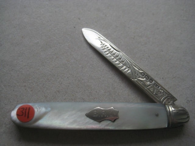 George V Mother of Pearl Hafted Silver Bladed Folding Fruit Knife: Title: George V Mother of Pearl Hafted Silver Bladed Folding Fruit Knife Description: George V Mother of Pearl Hafted Silver Bladed Folding Fruit Knife. The handle is plain. There is