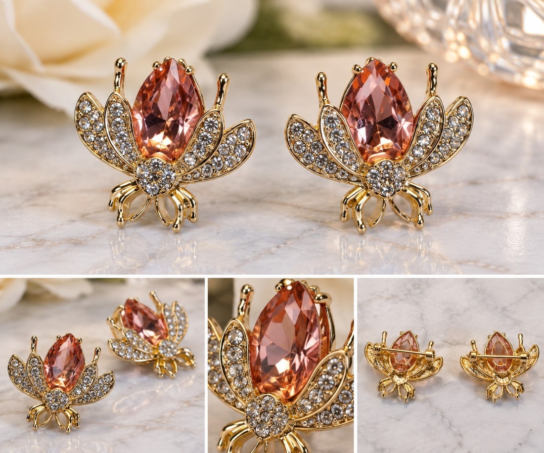 Pair of Matching Gold Tone Floral Brooches with Peach Pink Stones: Title: Pair of Matching Gold Tone Floral Brooches with Peach Pink Stones Description: Matching pair of gold tone floral brooches featuring faceted peach pink teardrop-shaped stones and sparkling