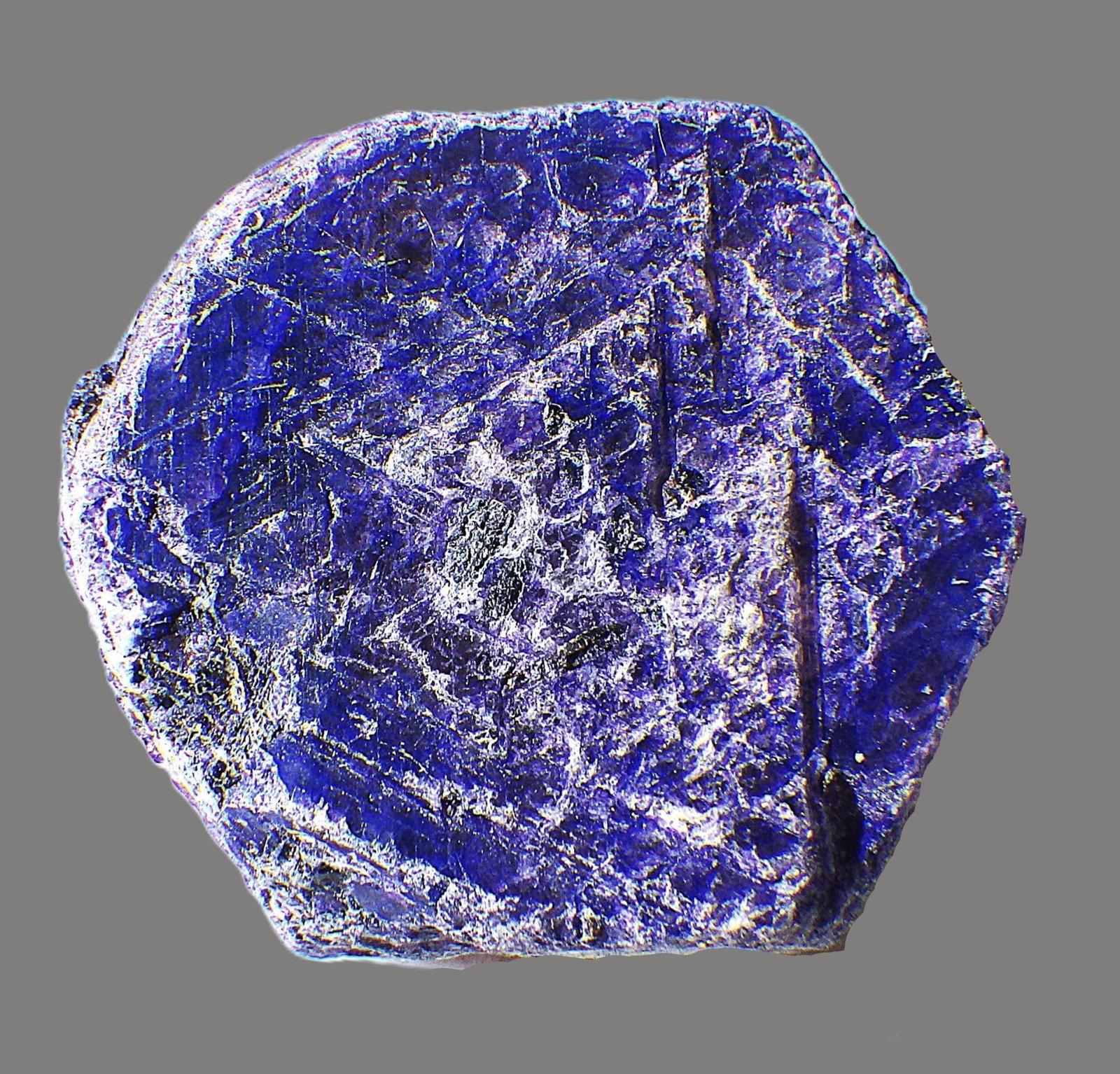 Natural Blue Sapphire Crystal 229 Carats: Title: Natural Blue Sapphire Crystal 229 Carats Description: A wonderful, totally natural, blue sapphire crystal that has not been treated, enhanced or polished. Prominent cleavage on both