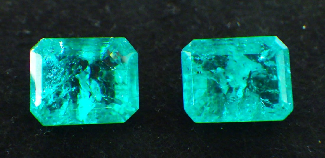 Pair Emerald Cut Emeralds 24 Carats (Total): Title: Pair Emerald Cut Emeralds 24 Carats (Total) Description: A pair of very attractive emerald cut simulated emeralds. Dimensions: 14 x 12 x 8 mm, total weight: 24 carats. Free delivery is