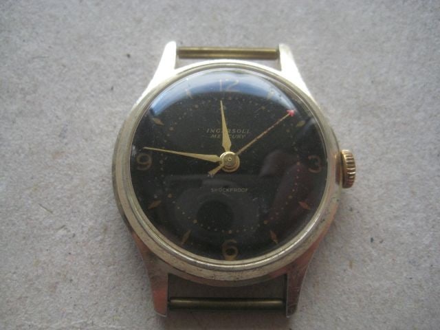 Vintage Gents Ingersoll Mercury Wrist Watch: Title: Vintage Gents Ingersoll Mercury Wrist Watch Description: Gents Ingersoll Mercury Shockproof Wrist Watch. The watch dates to around 1950. Diameter of Watch is 31.75mm approximately.