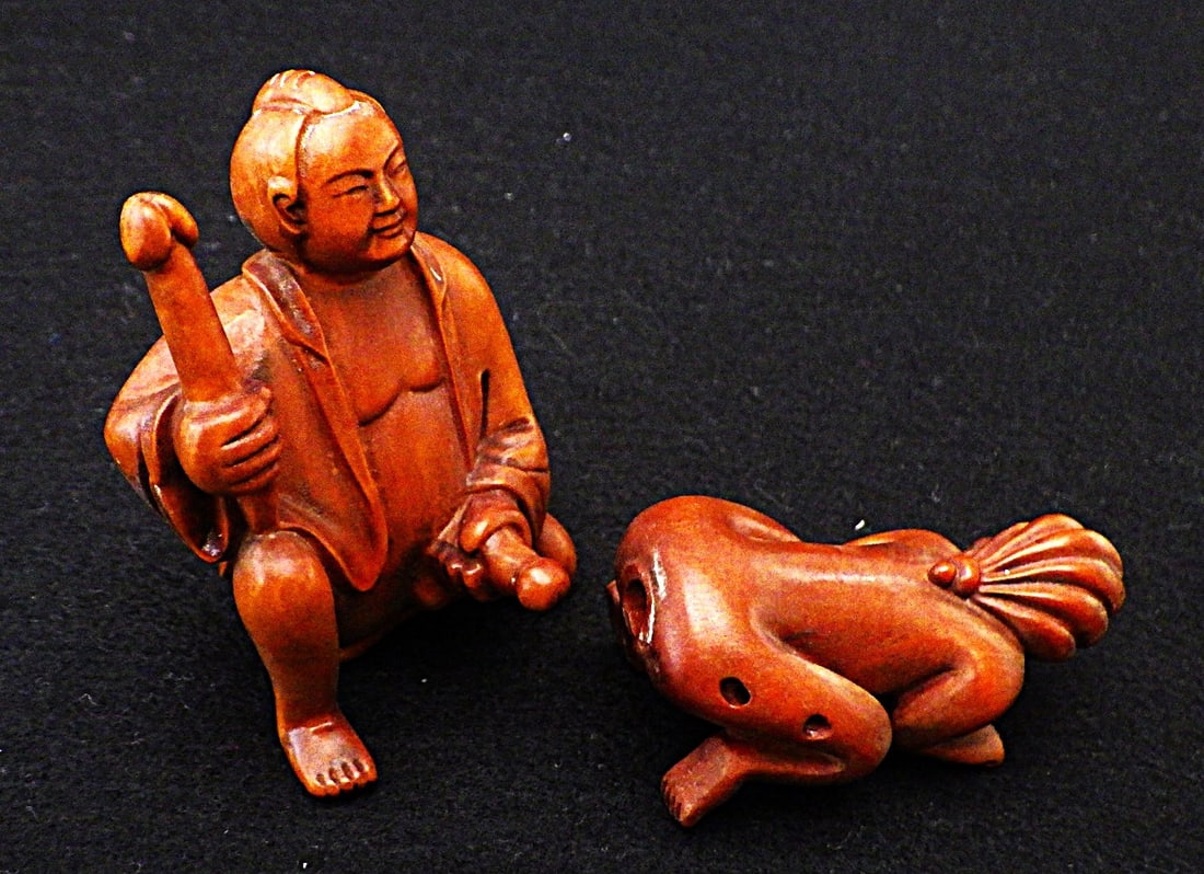 Two Vintage Japanese Boxwood Netsukes (Pair): Title: Two Vintage Japanese Boxwood Netsukes (Pair) Description: A pair of vintage, erotic, boxwood netsukes from Japan: "The Master of pleasure holding a HARIGATA and having fun with his