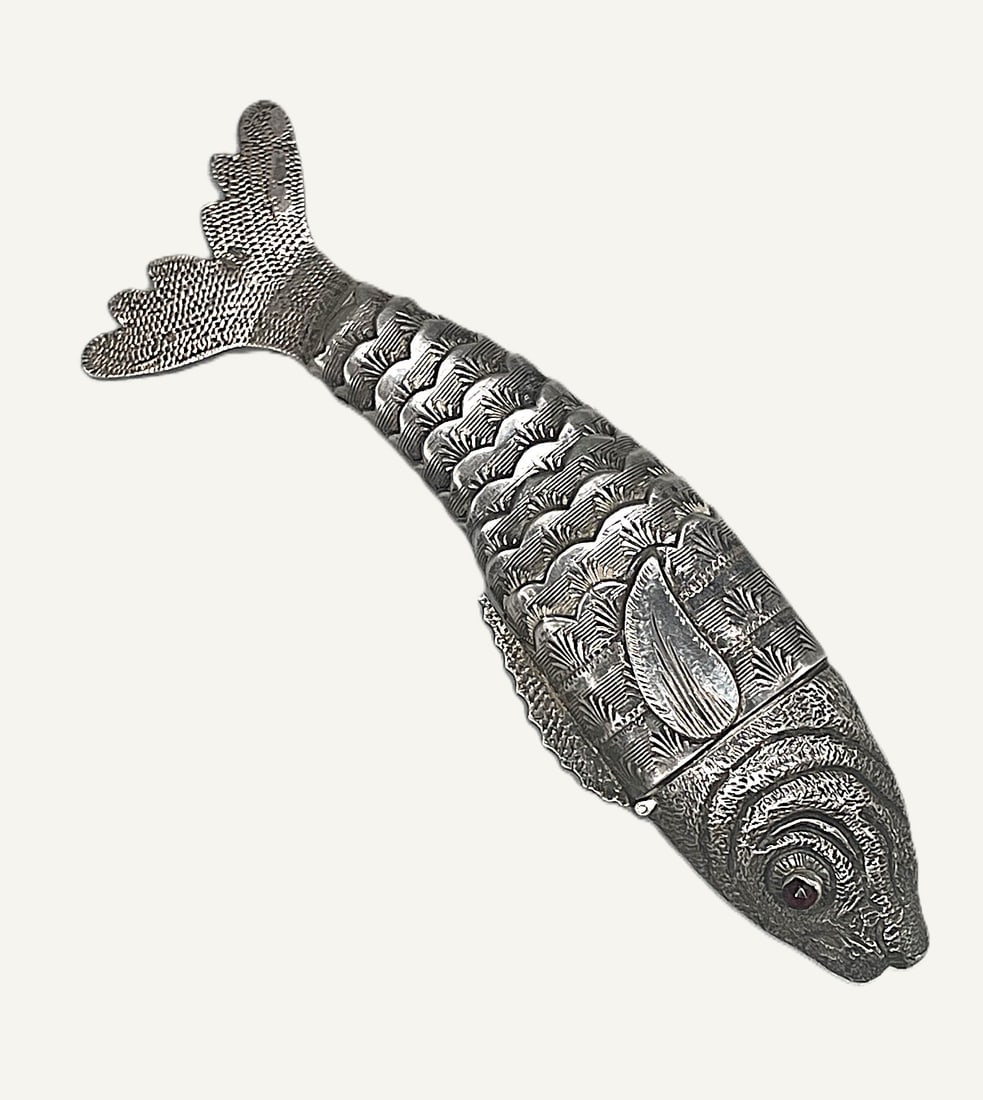 Silver Articulated Scent Bottle: Title: Silver Articulated Scent Bottle Description: Large Dutch silver articulated scent bottle with red faceted eyes. Fish head open to reveal a silver mounted cork stopper. As well as