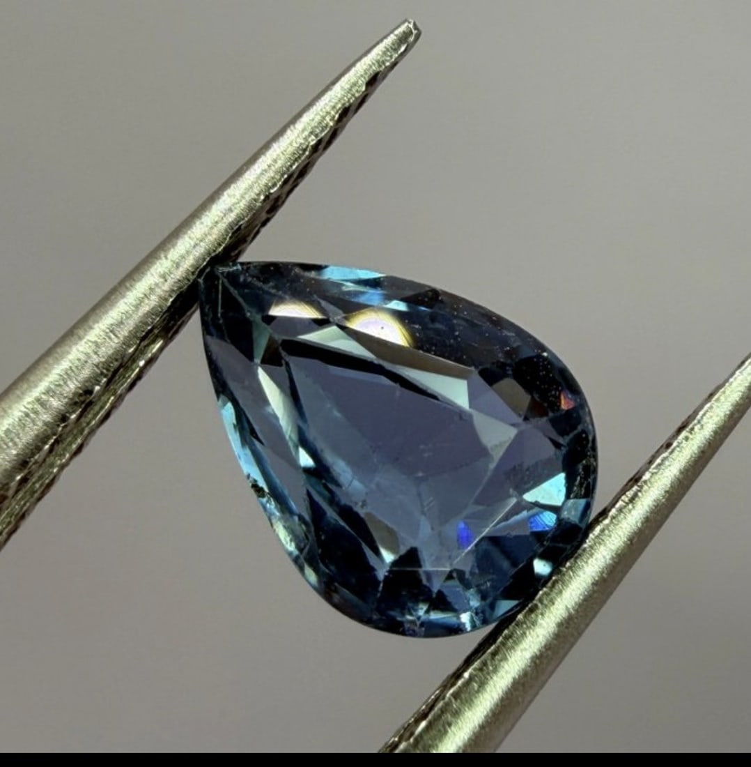 1.03ct Natural Blue Spinel — Pear Mixed Cut — IGI Certified — Untreated: Title: 1.03ct Natural Blue Spinel — Pear Mixed Cut — IGI Certified — Untreated Description: Natural blue spinel weighing 1.03 carats. Pear shape, mixed cut. Transparent,
