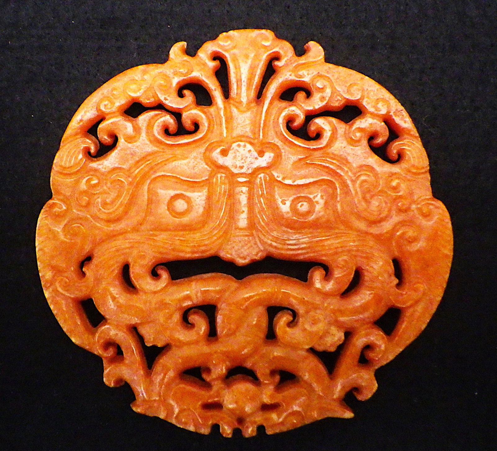 A Vintage Chinese Hand Carved Anthropomorphic Orange Jade Amulet: Title: A Vintage Chinese Hand Carved Anthropomorphic Orange Jade Amulet Description: A vintage, ornate, anthropomorphic, hand carved Chinese orange jade amulet in clean excellent condition. 