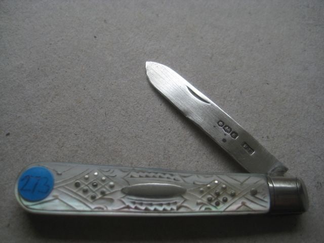George V Mother of Pearl Hafted Silver Bladed Folding Fruit Knife: Title: George V Mother of Pearl Hafted Silver Bladed Folding Fruit Knife Description: George V Mother of Pearl Hafted Silver Bladed Folding Fruit Knife. The handle is decorated with
