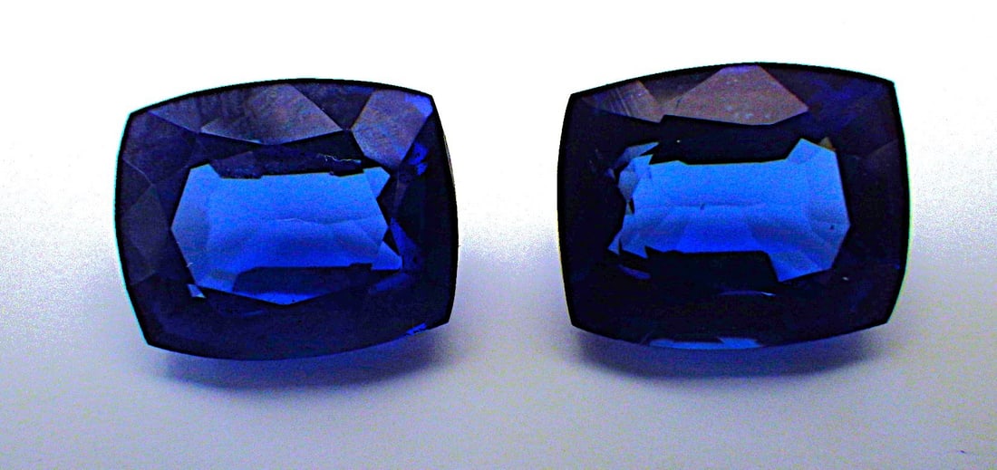 Pair Radiant Cut Tanzanite 20 Carats (Total): Title: Pair Radiant Cut Tanzanite 20 Carats (Total) Description: A beautiful pair of simulated (man made), radiant cut tanzanite. Dimensions: 12 x 10 x 6 mm (each), weight: 20 carats