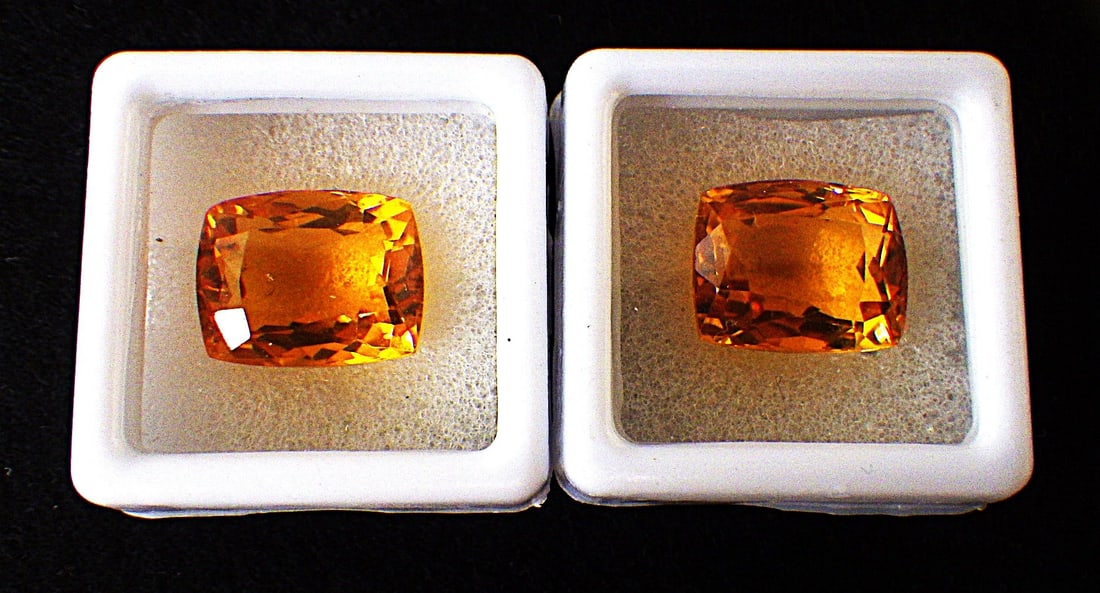 Pair Radian Cut Citrines 22 Carats (Total): Title: Pair Radian Cut Citrines 22 Carats (Total) Description: A wonderful pair of radiant cut citrines. Dimensions: 15 x 12 x 9 mm, total weight: 22 carats. Excellent colour saturation and