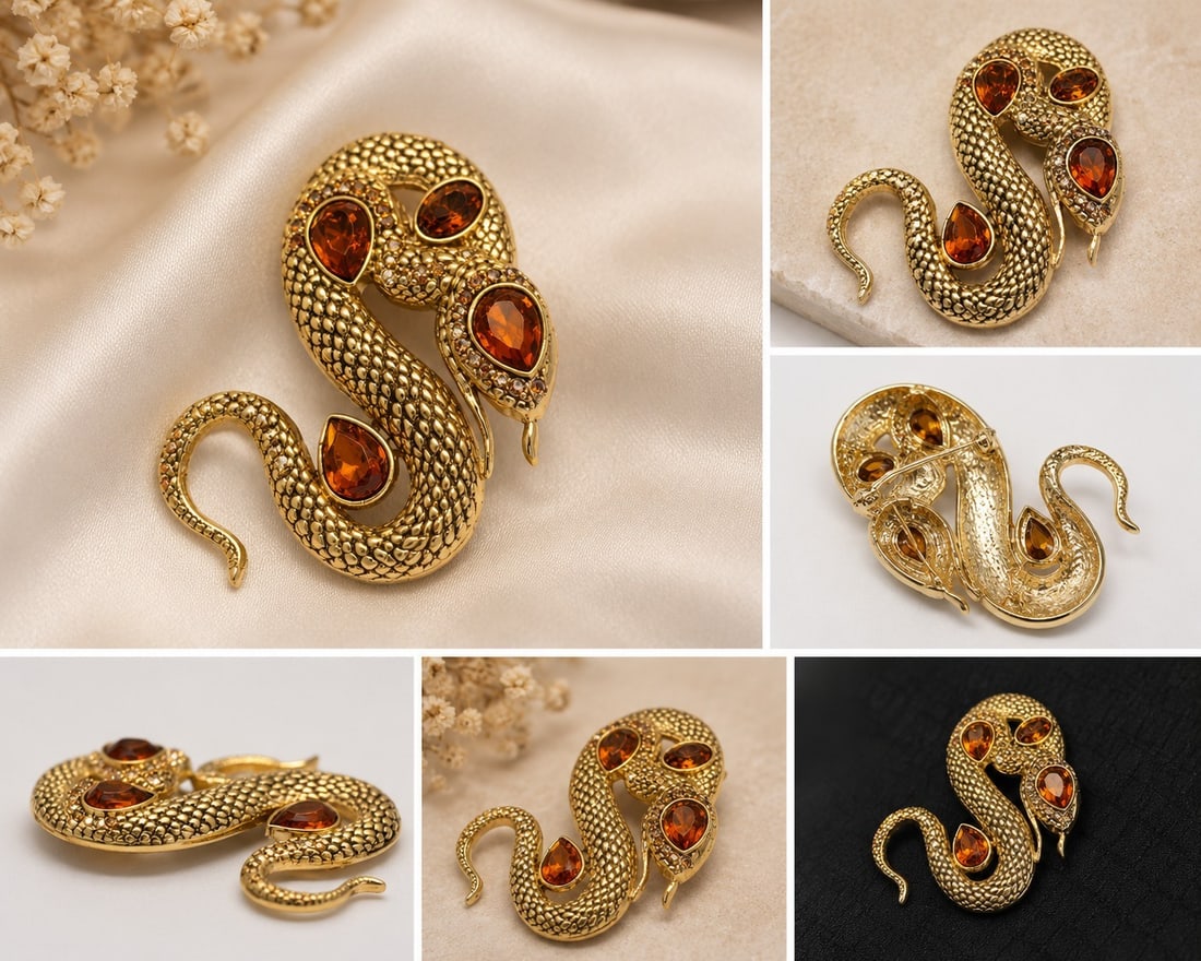 Gold Tone Snake Brooch with Amber-Colour Stones: Title: Gold Tone Snake Brooch with Amber-Colour Stones Description: Striking snake-shaped brooch featuring detailed textured scale work in a gold-tone finish. Decorated with faceted amber-colour