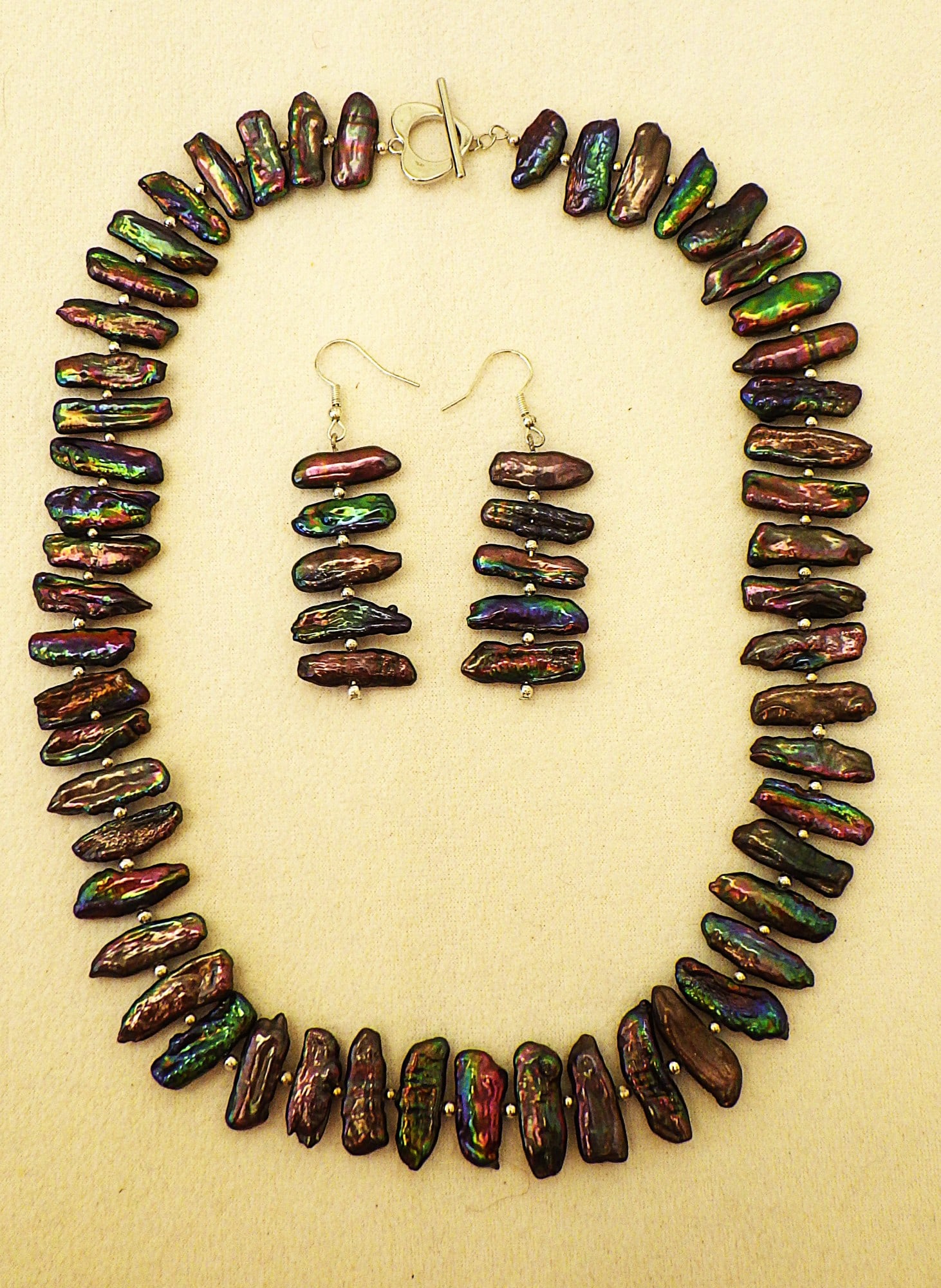 Exceptional Natural Black BIWA Pearl Necklace & Earrings Set: Title: Exceptional Natural Black BIWA Pearl Necklace & Earrings Set Description: An exceptional natural black elongate iridescent pearl (often called BIWA pearls) necklace and earrings set. 