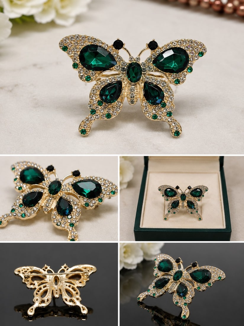 Green Crystal Butterfly Brooch – Gold Tone: Title: Green Crystal Butterfly Brooch – Gold Tone Description: Elegant butterfly brooch featuring large faceted deep-green stones surrounded by sparkling clear and green crystal accents.